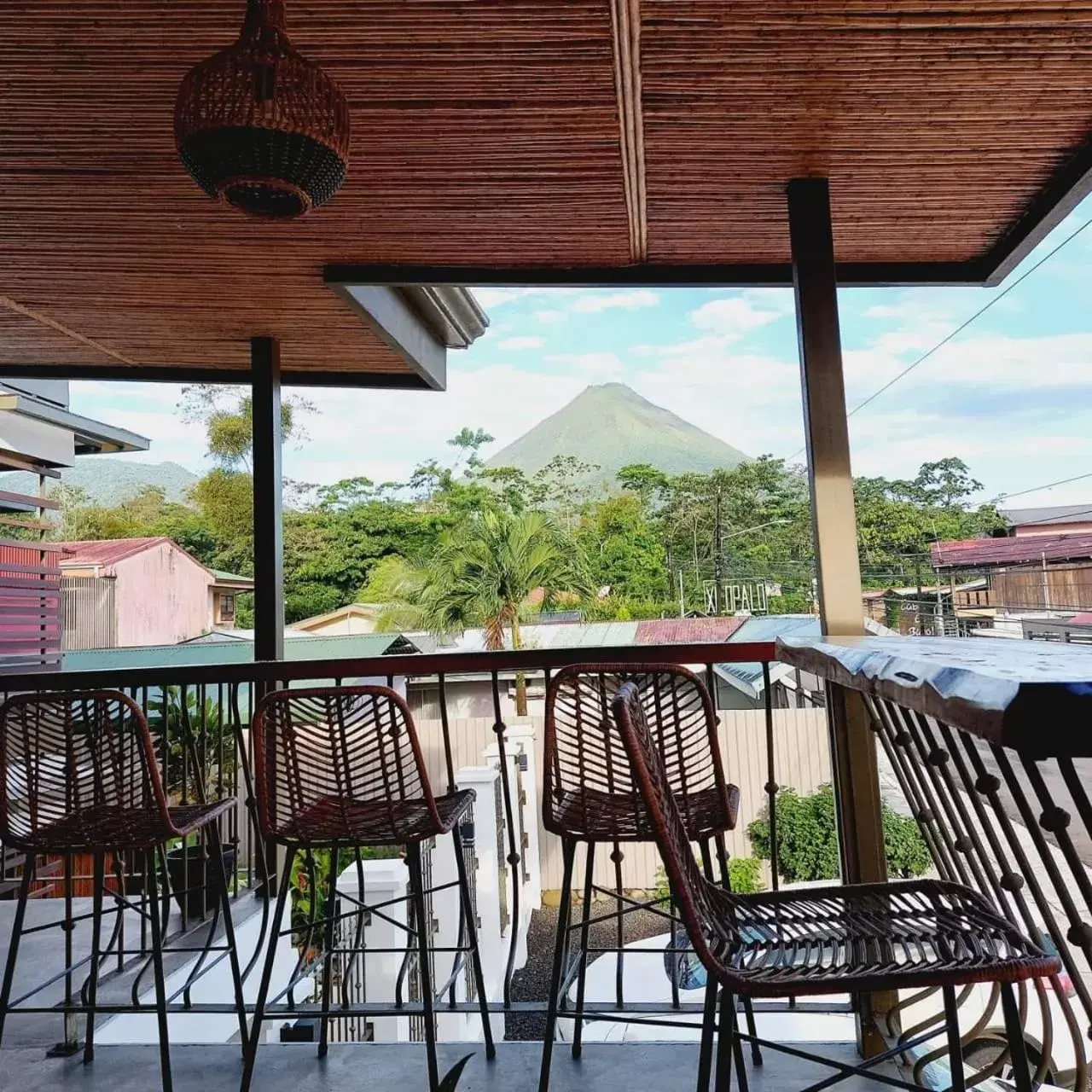 Patio, Balcony/Terrace in La Fortuna Lodge by Treebu Hotels