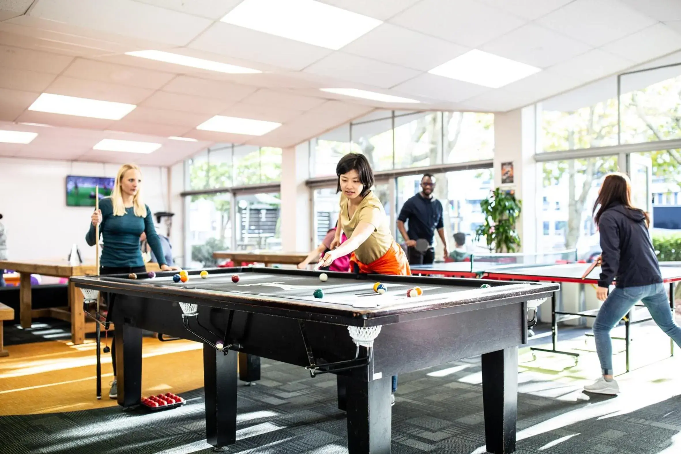 Communal lounge/ TV room, Billiards in YMCA Hostel