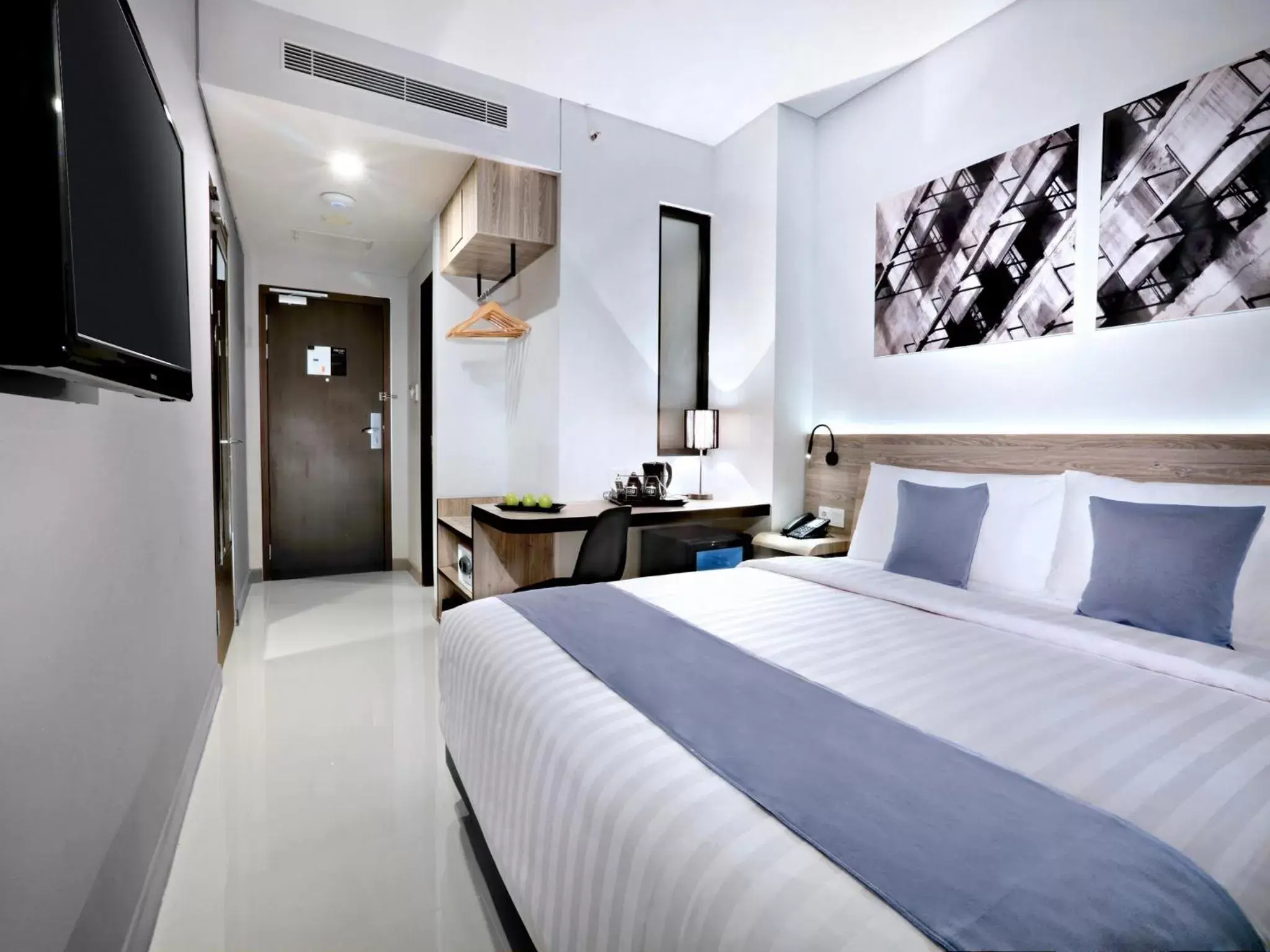 Bed in Hotel Neo Gajah Mada Pontianak by ASTON