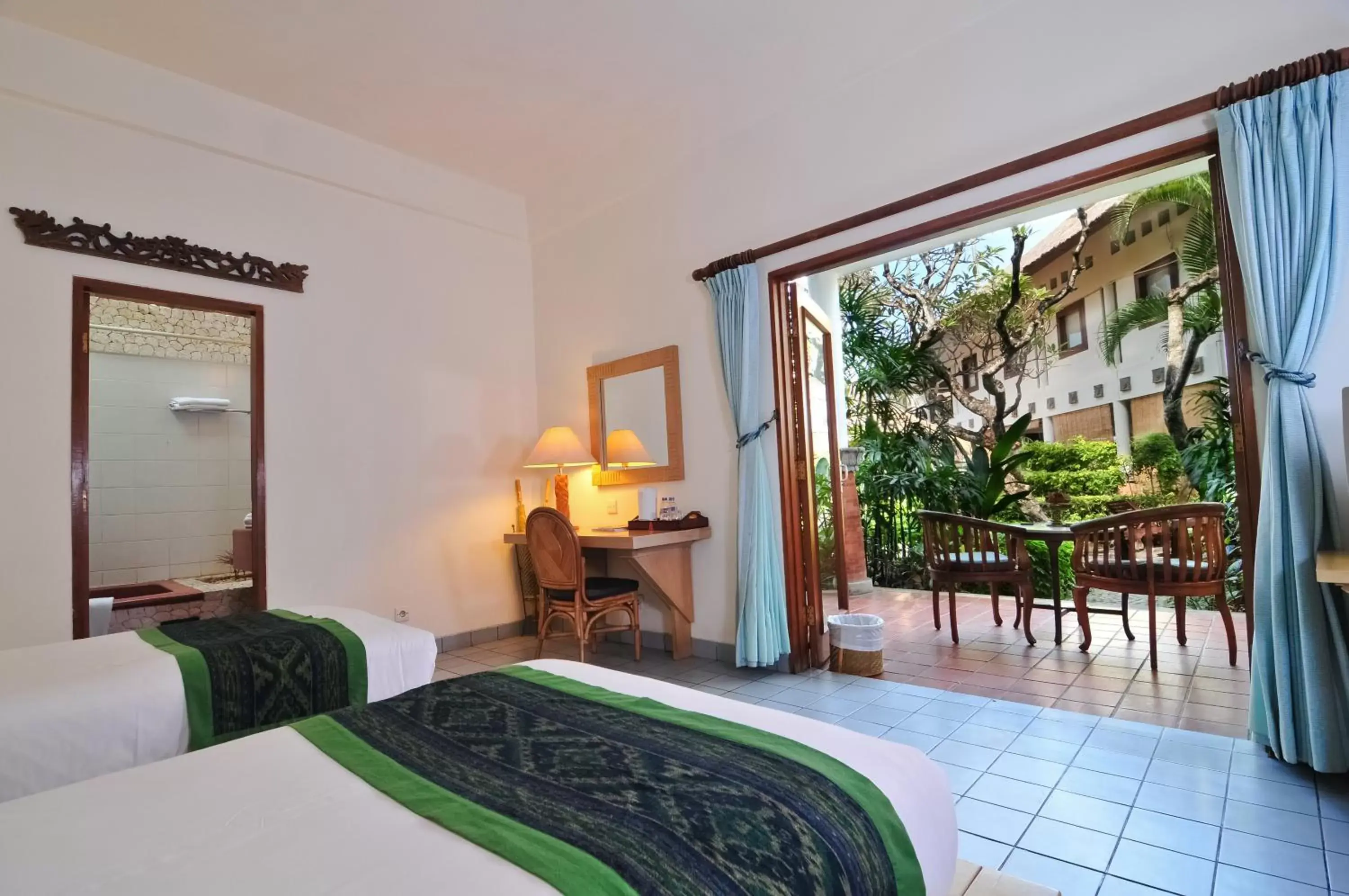Deluxe Double or Twin Room With Extra Bed in Sativa Sanur Cottages