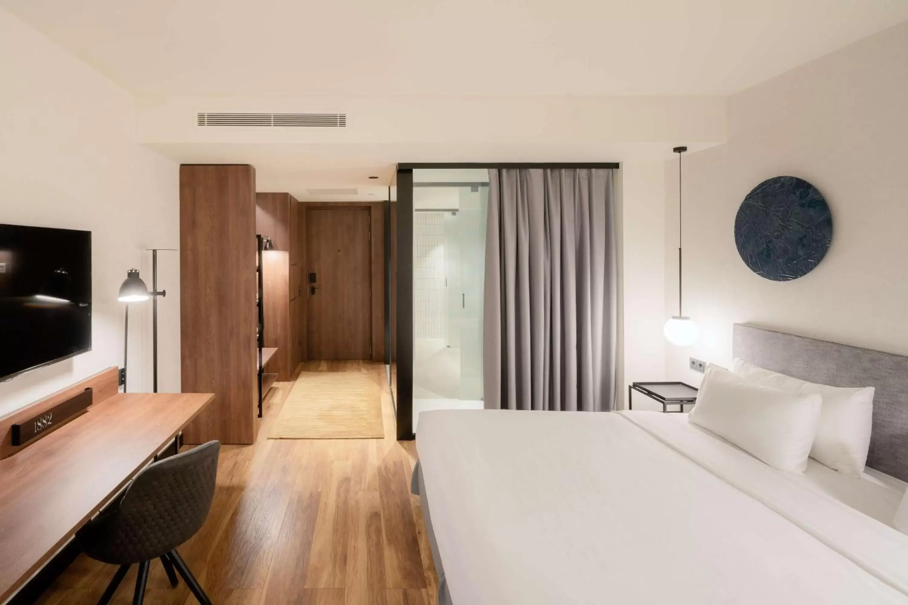 Bedroom, TV/Entertainment Center in Radisson Blu 1882 Hotel, Barcelona Sagrada Familia