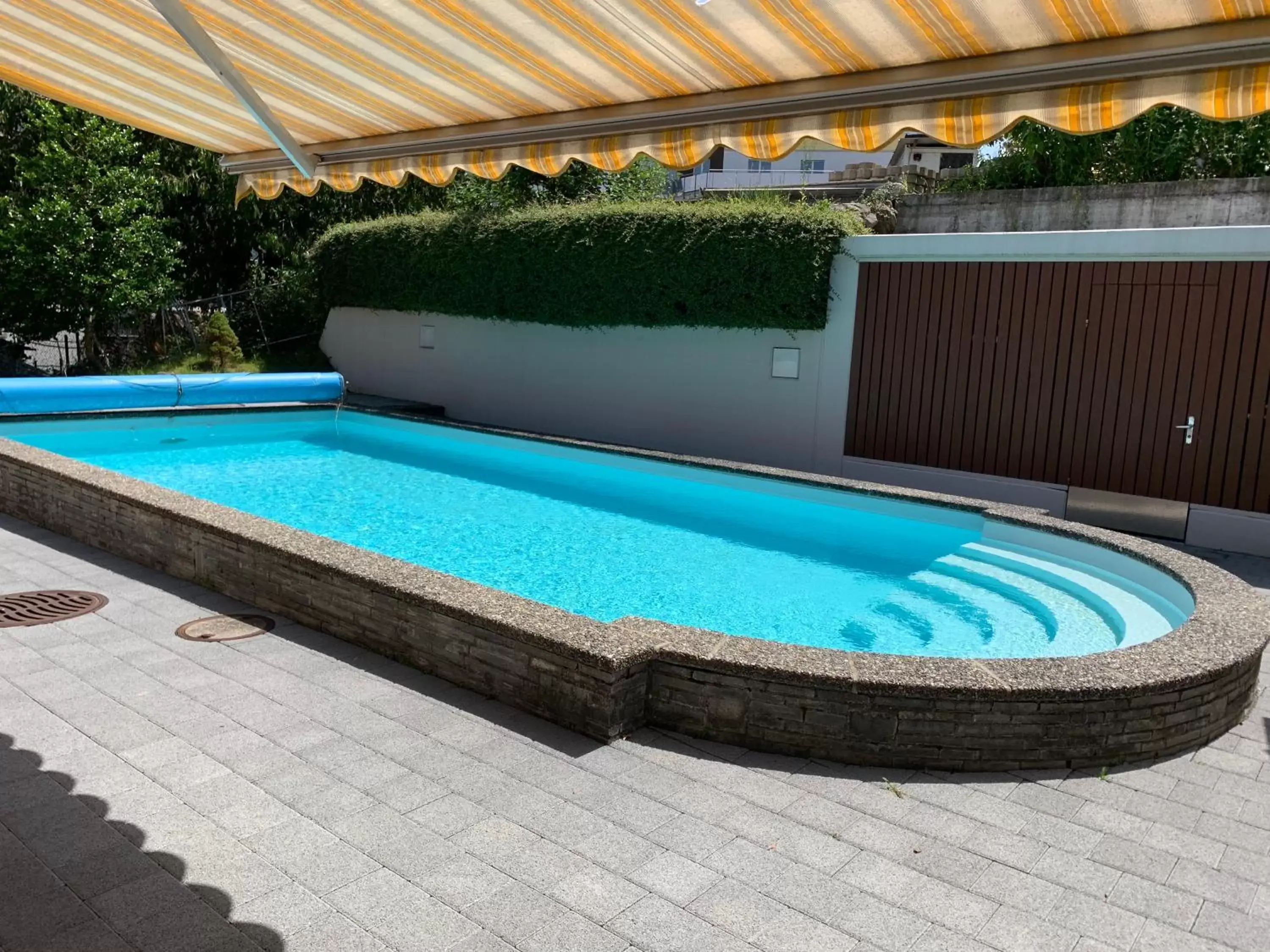 Garden, Swimming Pool in Hotel Krone