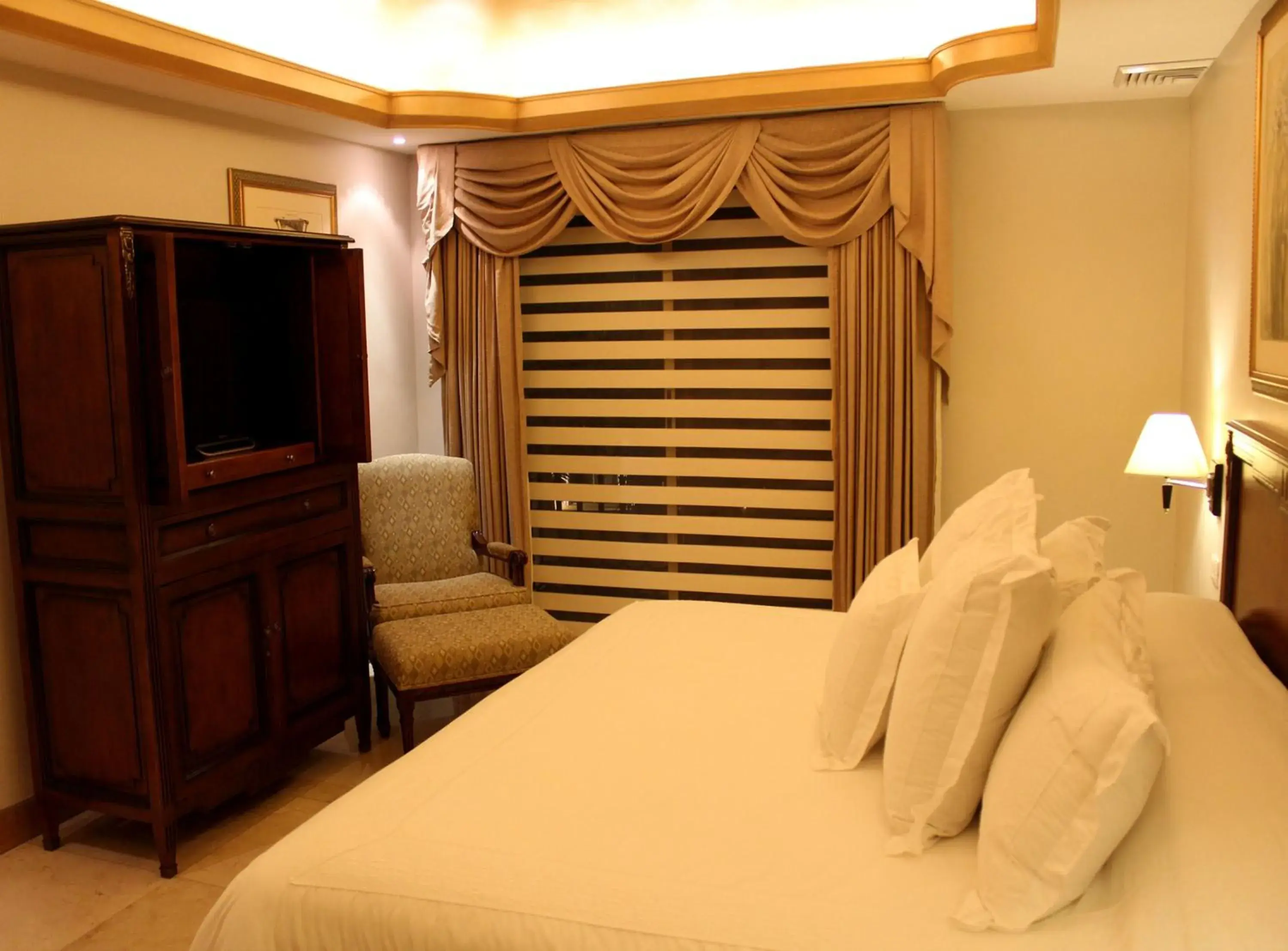 Bed in Hotel Hacienda Real