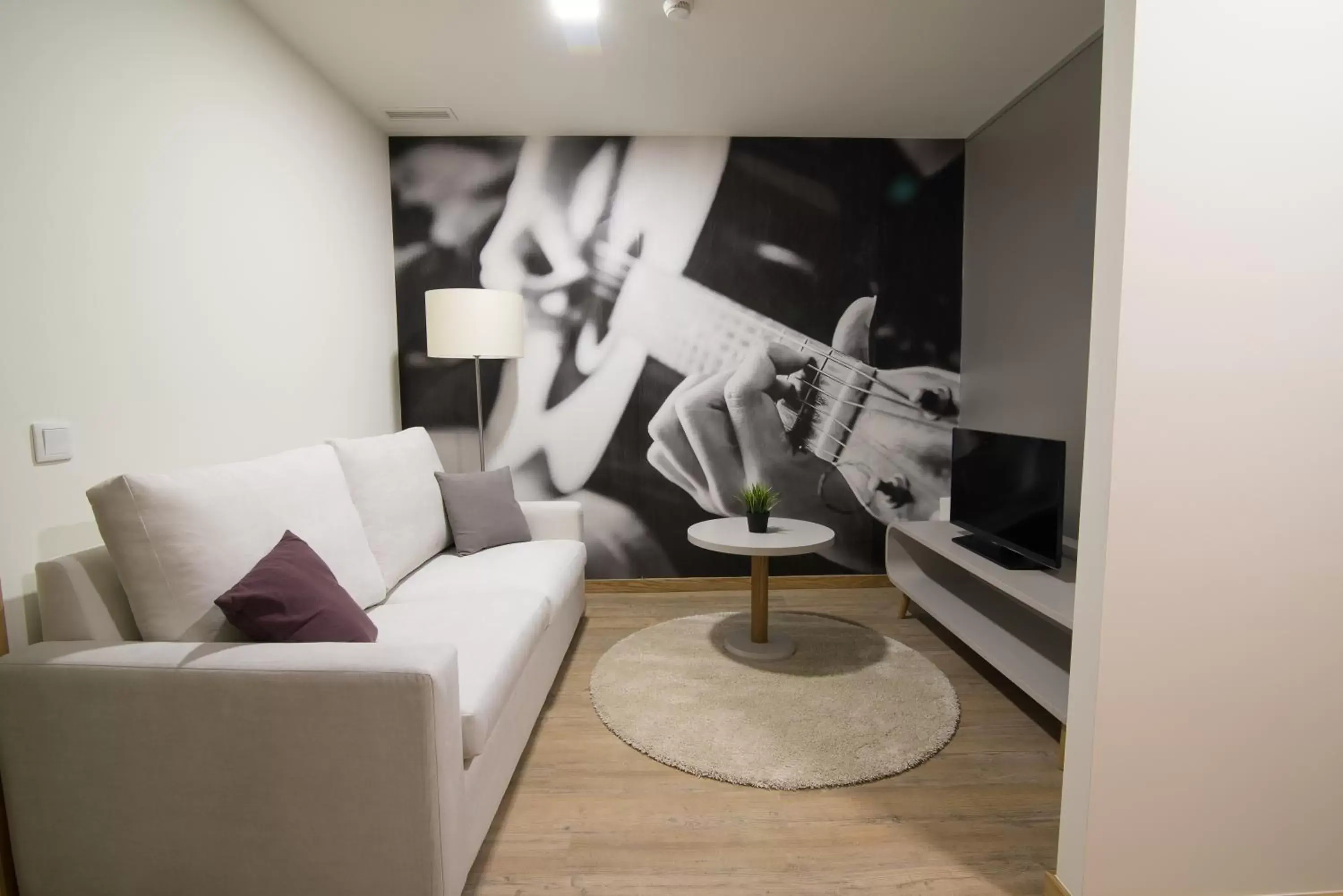 TV and multimedia, Seating Area in Porto Coliseum Hotel