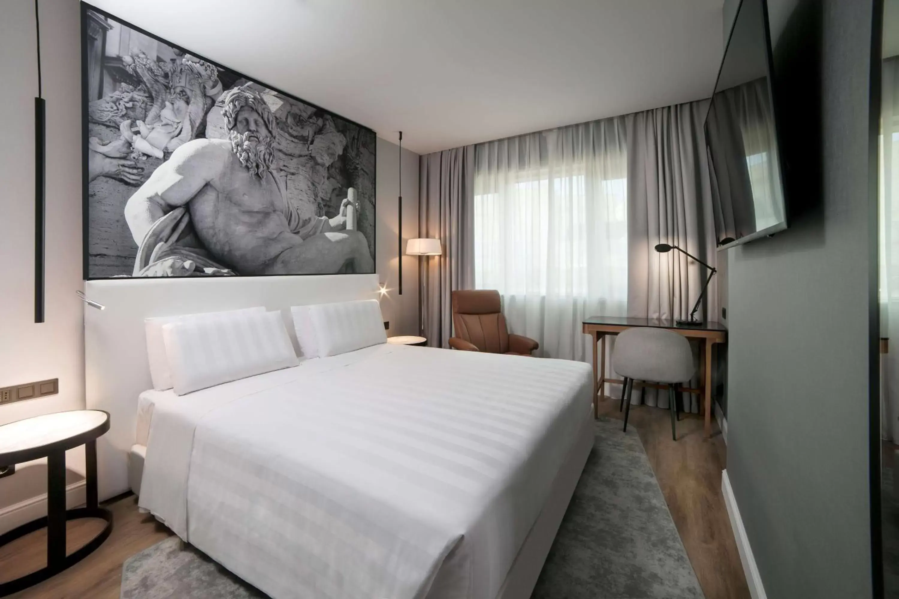 Photo of the whole room, Bed in Radisson Blu GHR Rome