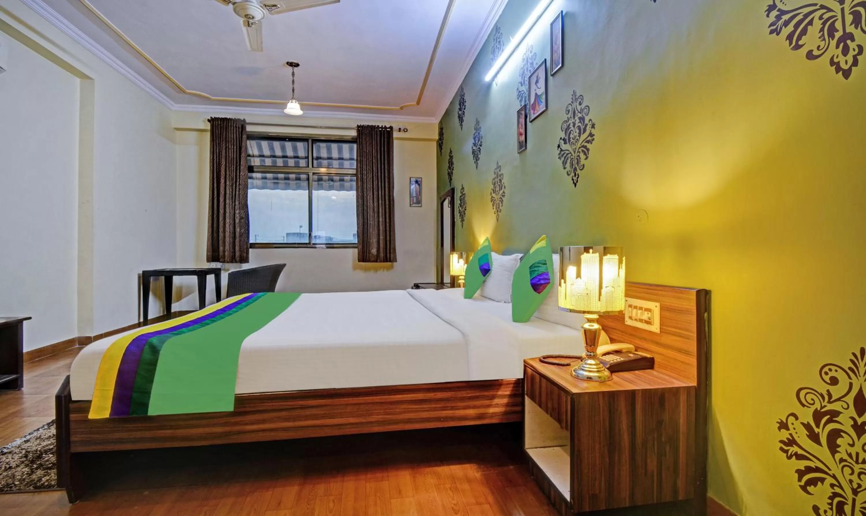 Bedroom, Bed in Treebo New Rockwell Vivek Vihar