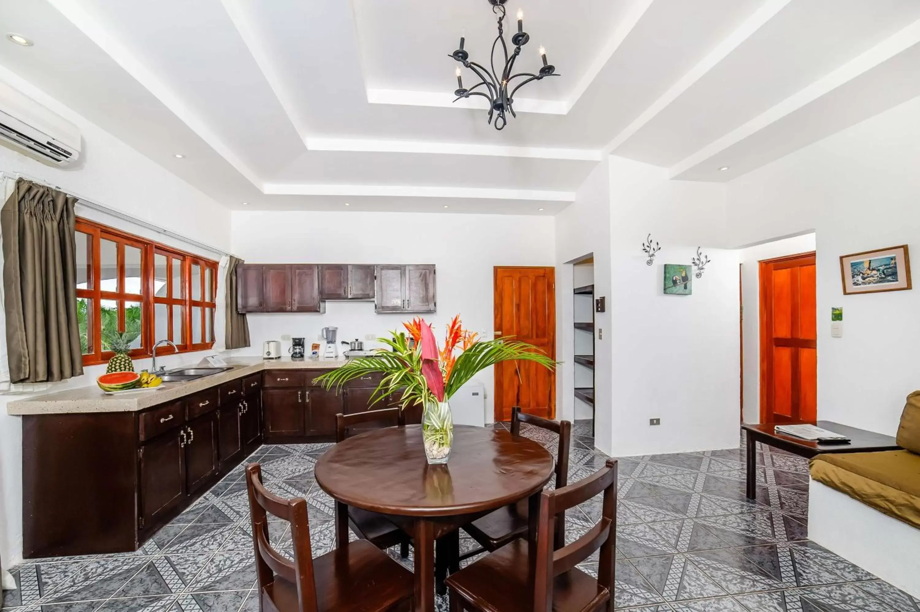 Living room, Dining Area in Best Western Tamarindo Vista Villas
