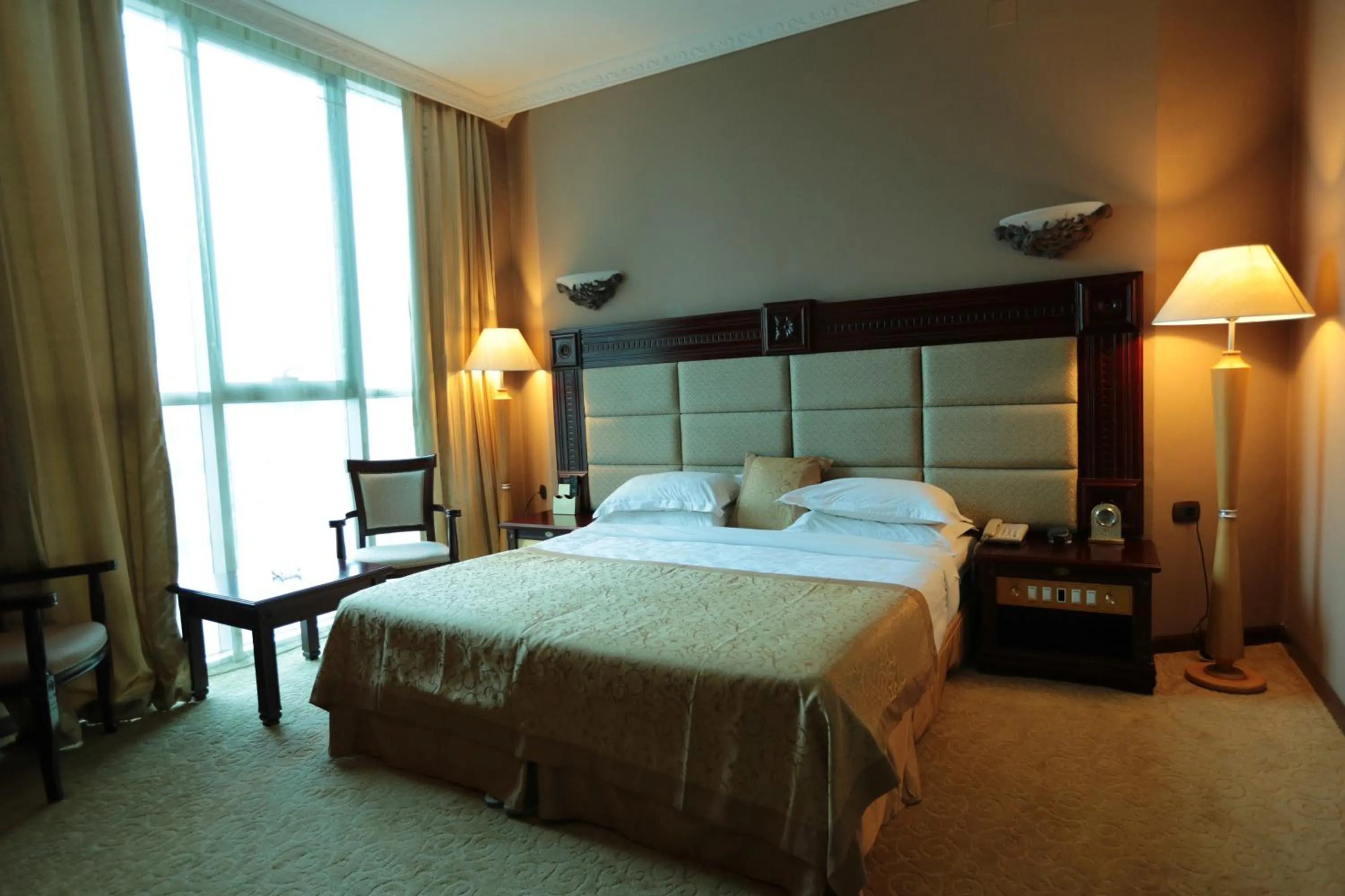 Bedroom, Bed in Friendship International Hotel