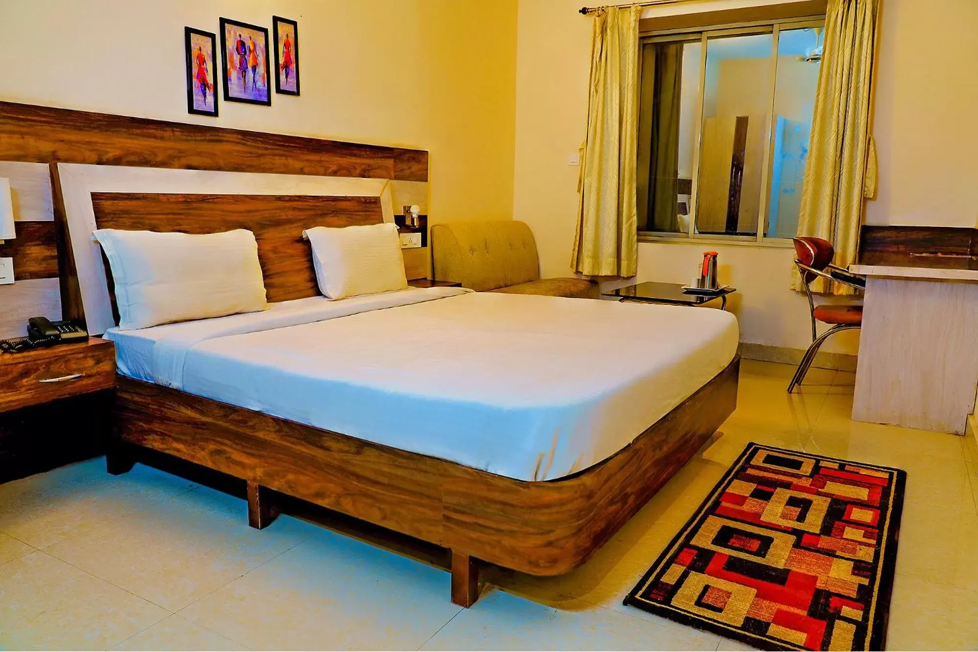 Bed in FabHotel Kanchan Plaza