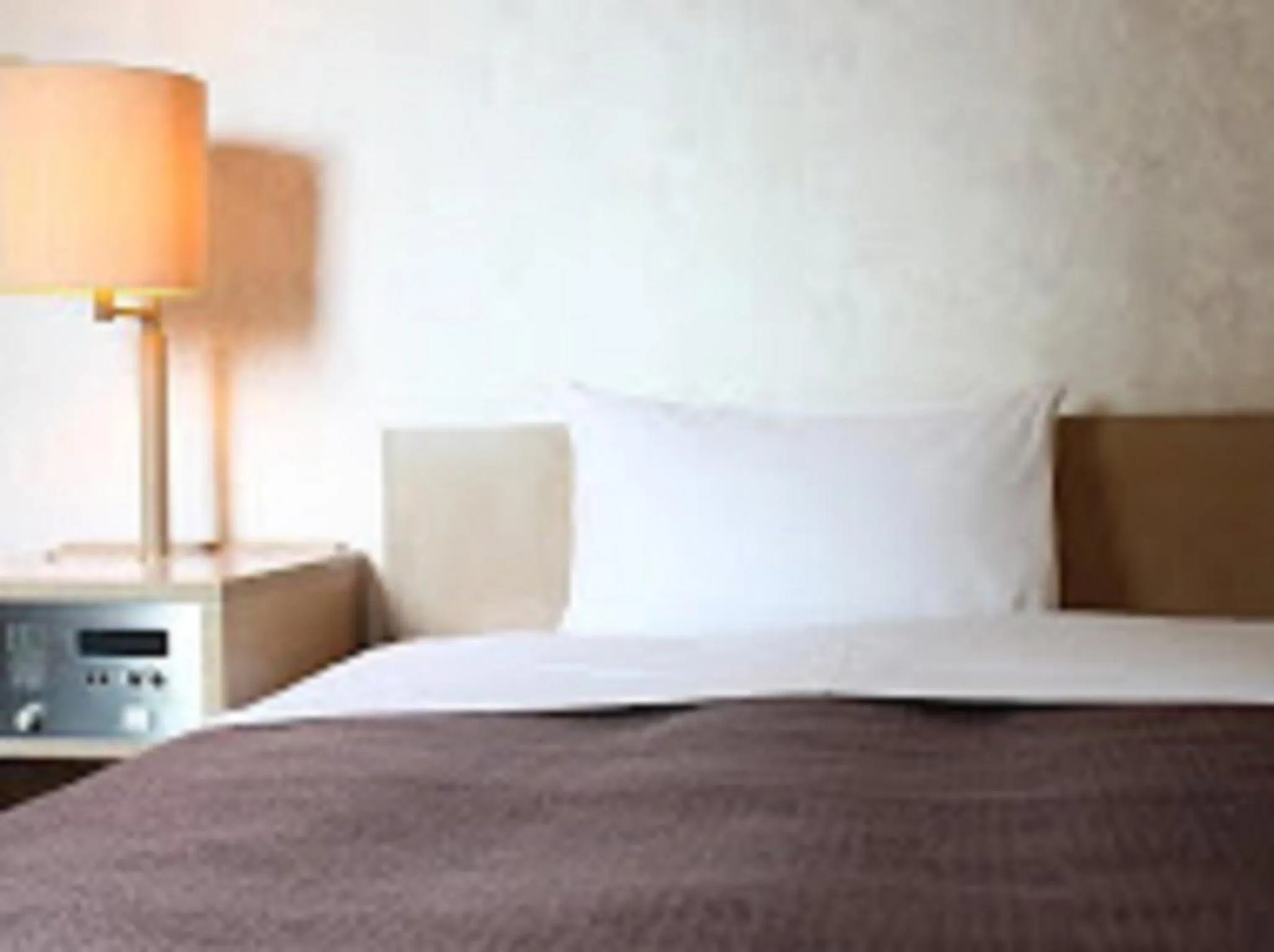 Bed in HOTEL LiVEMAX BUDGET Fuchu Annex