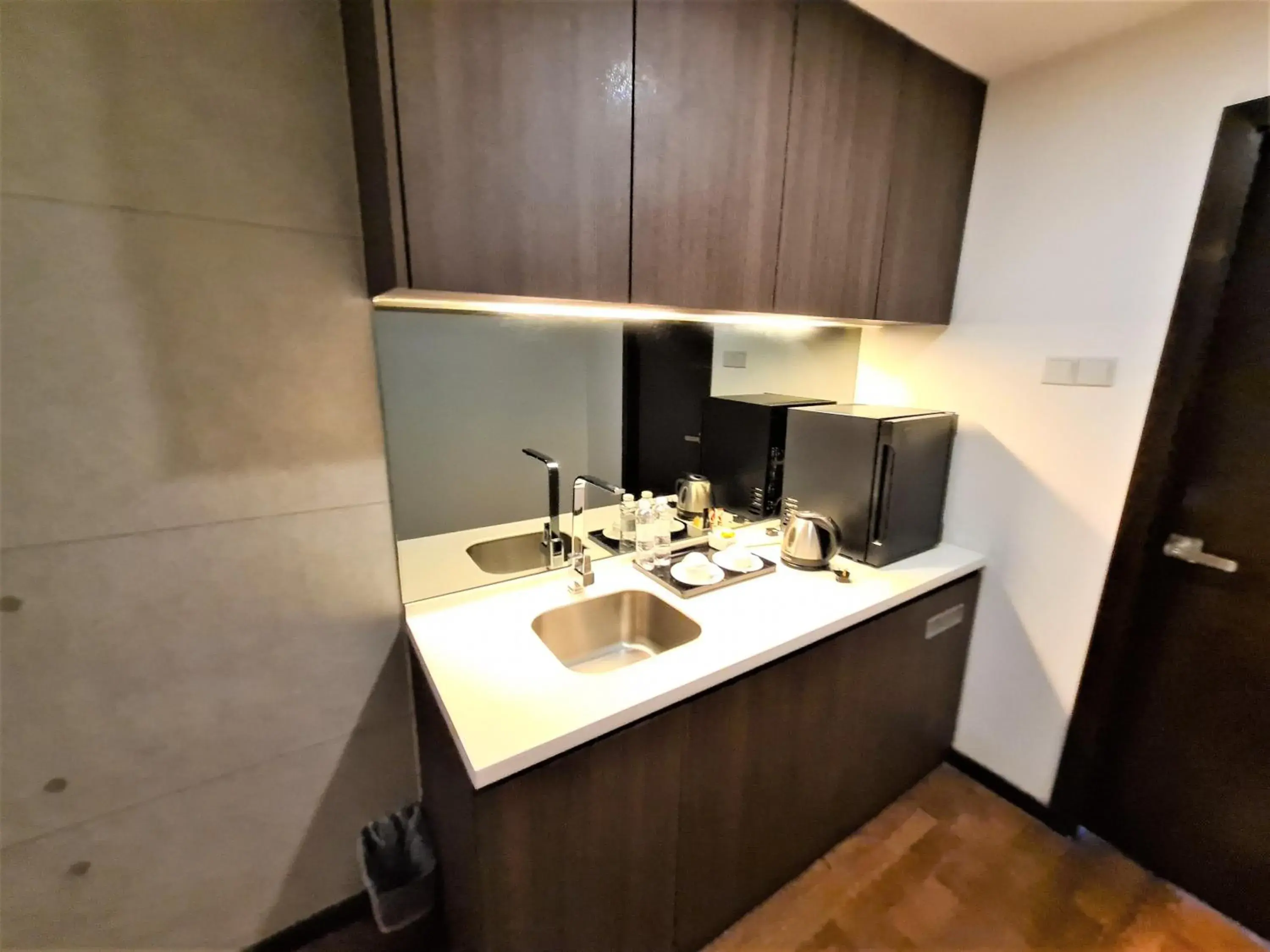 Kitchen/Kitchenette in Nexus Regency Suites & Hotel