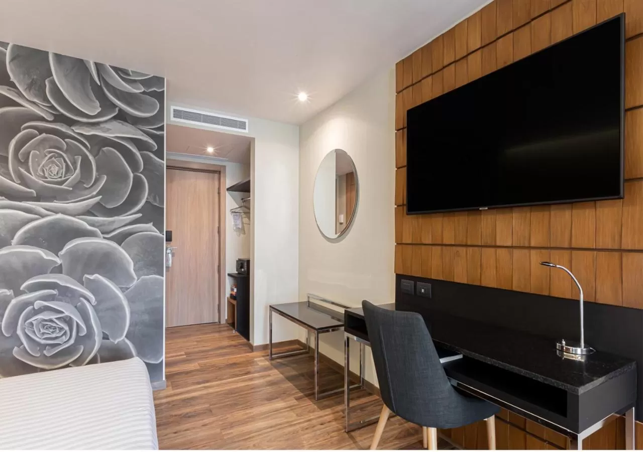 Communal lounge/ TV room in Hotel Real del Rio