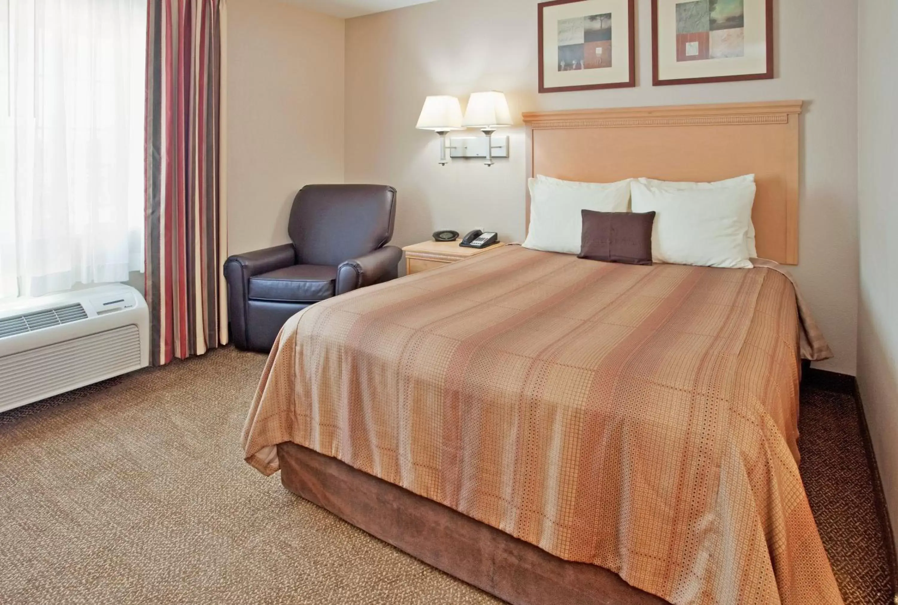 Photo of the whole room, Bed in Candlewood Suites Junction City - Ft. Riley, an IHG Hotel