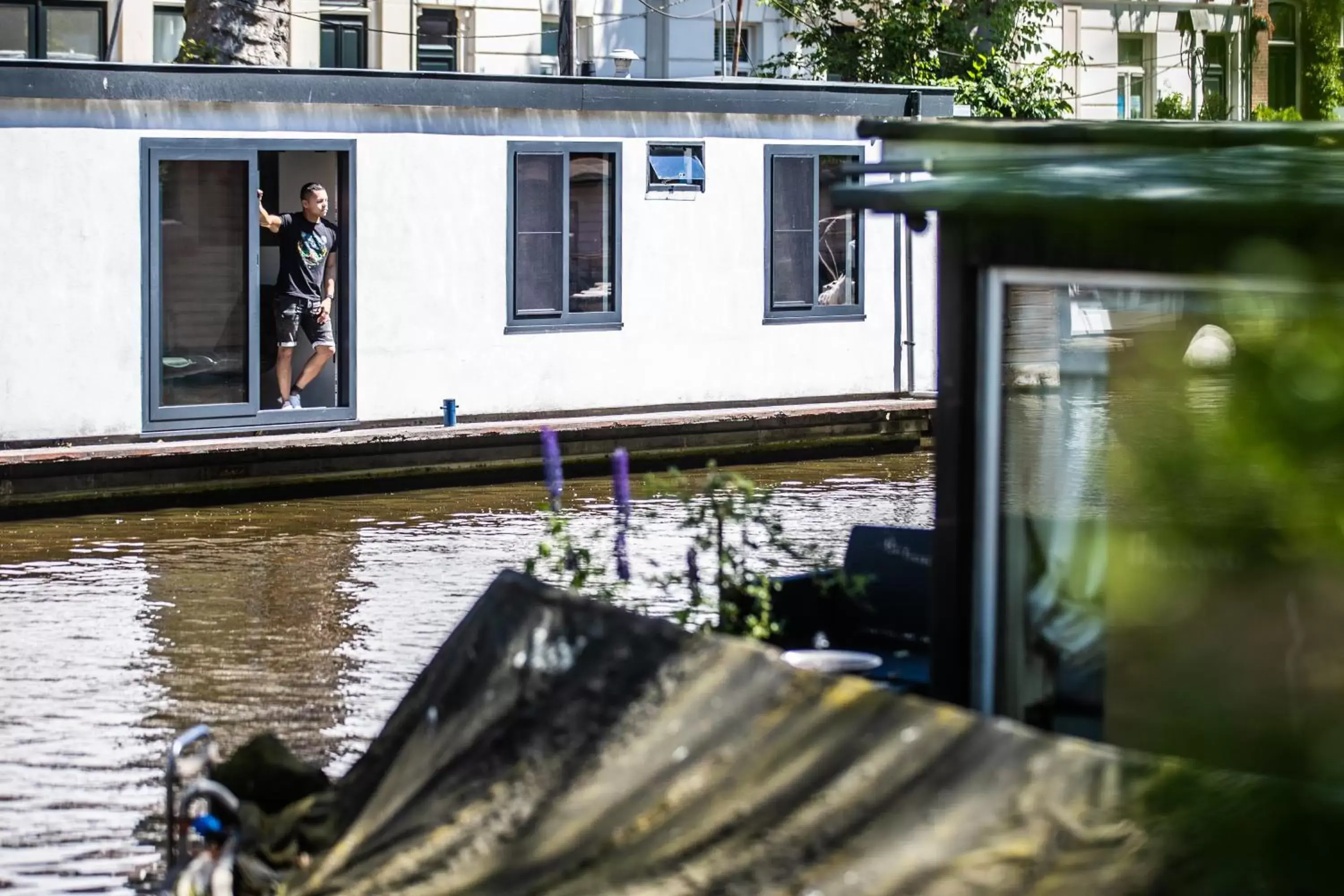Property building in Amsterdam Houseboat amstel