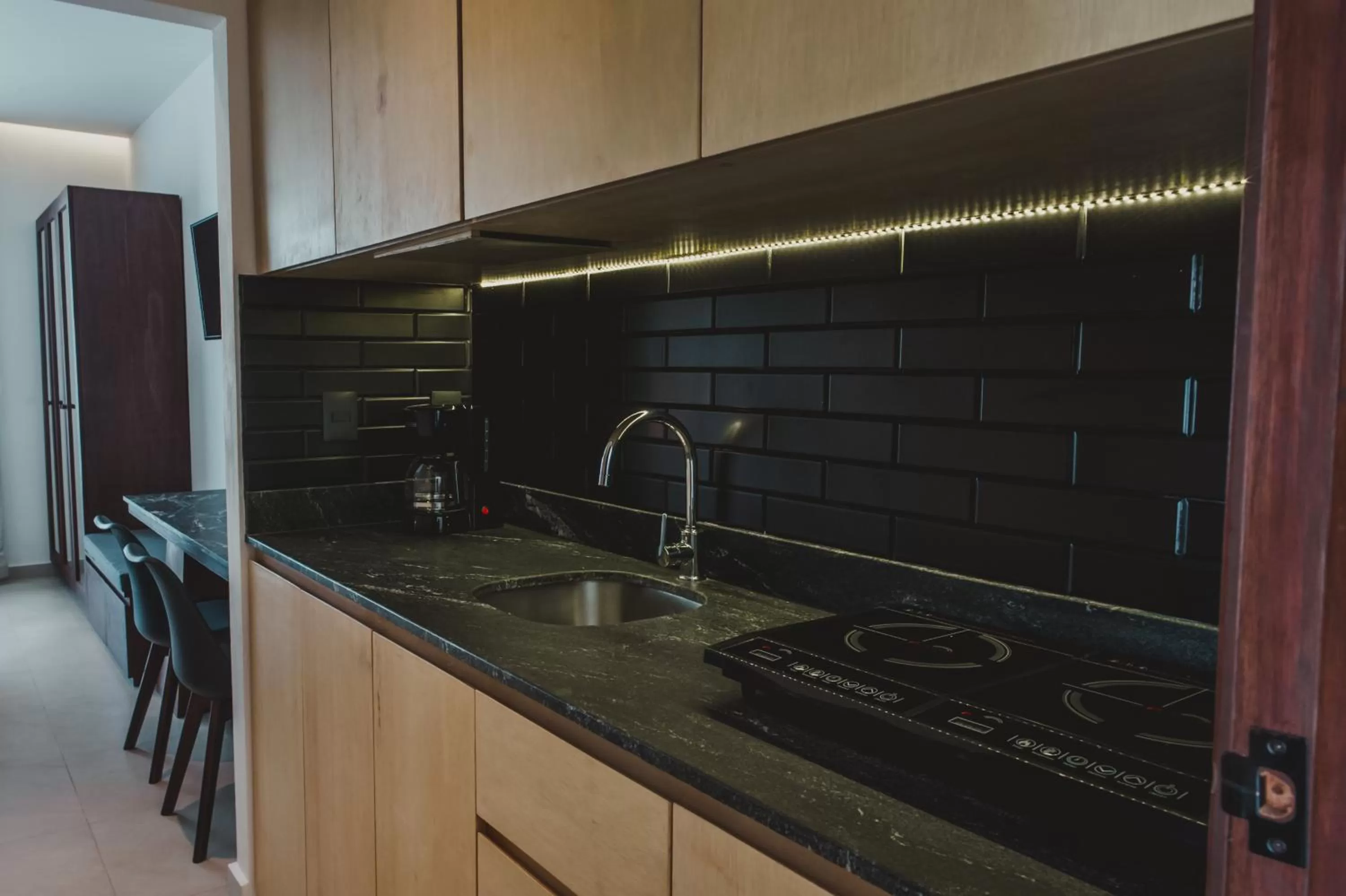 Kitchen or kitchenette in Ah Xok Suites