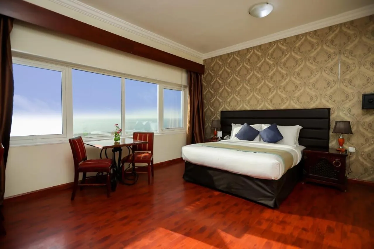 Bed in Mermaid Beach Hotel LLC