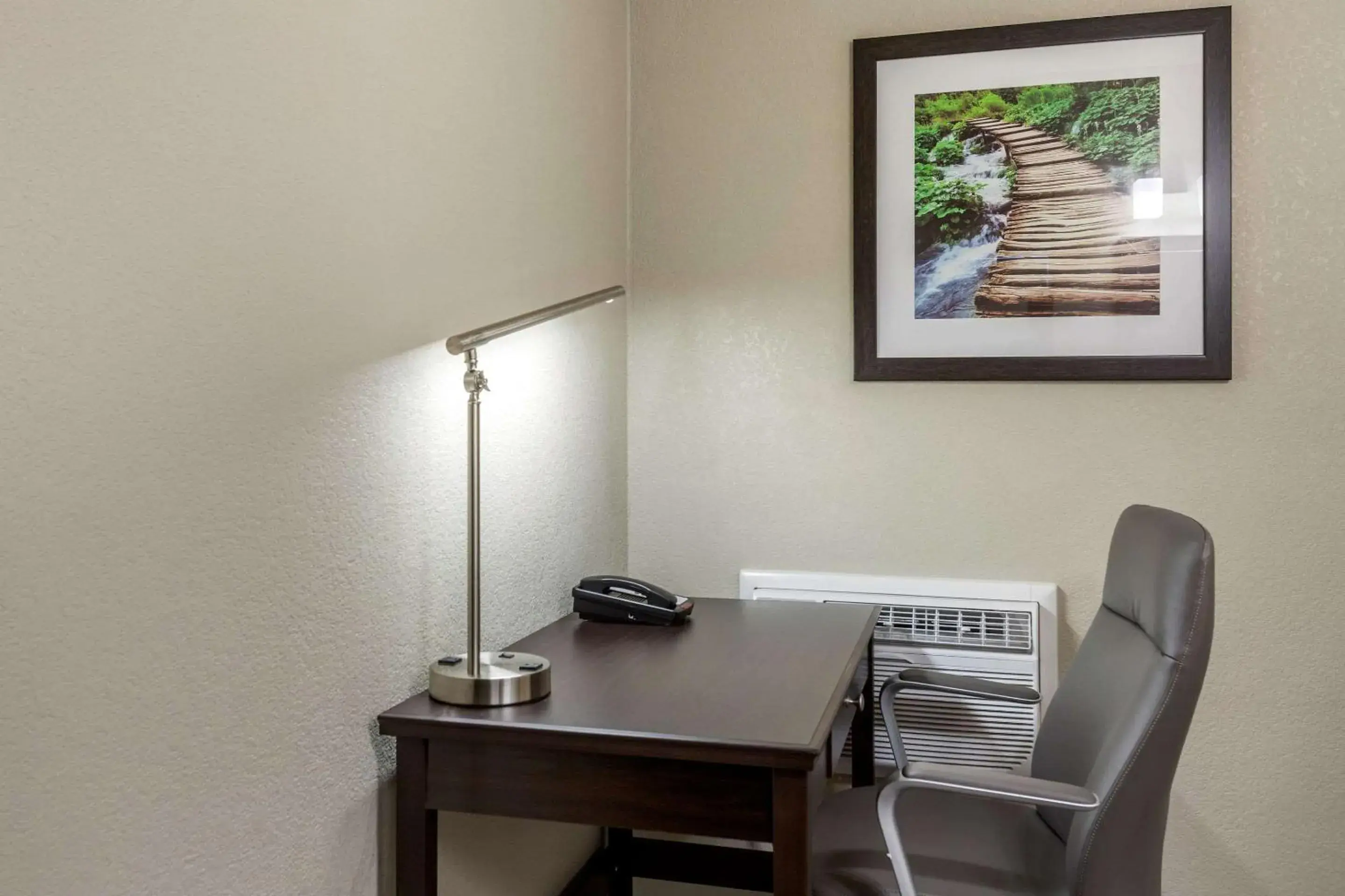 Bedroom in Rodeway Inn & Suites