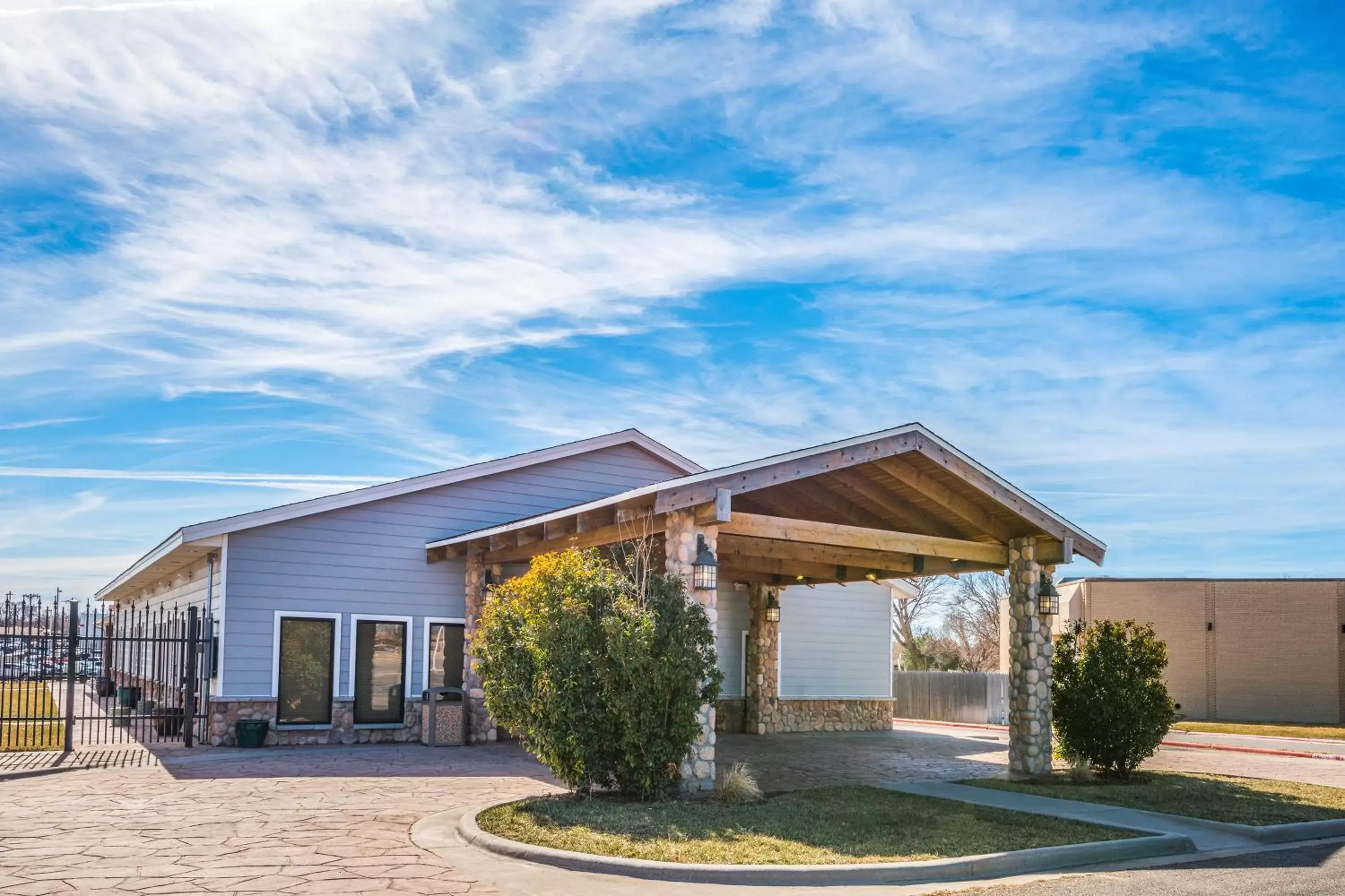 Facade/entrance, Property Building in AmericInn by Wyndham Pampa Event Center