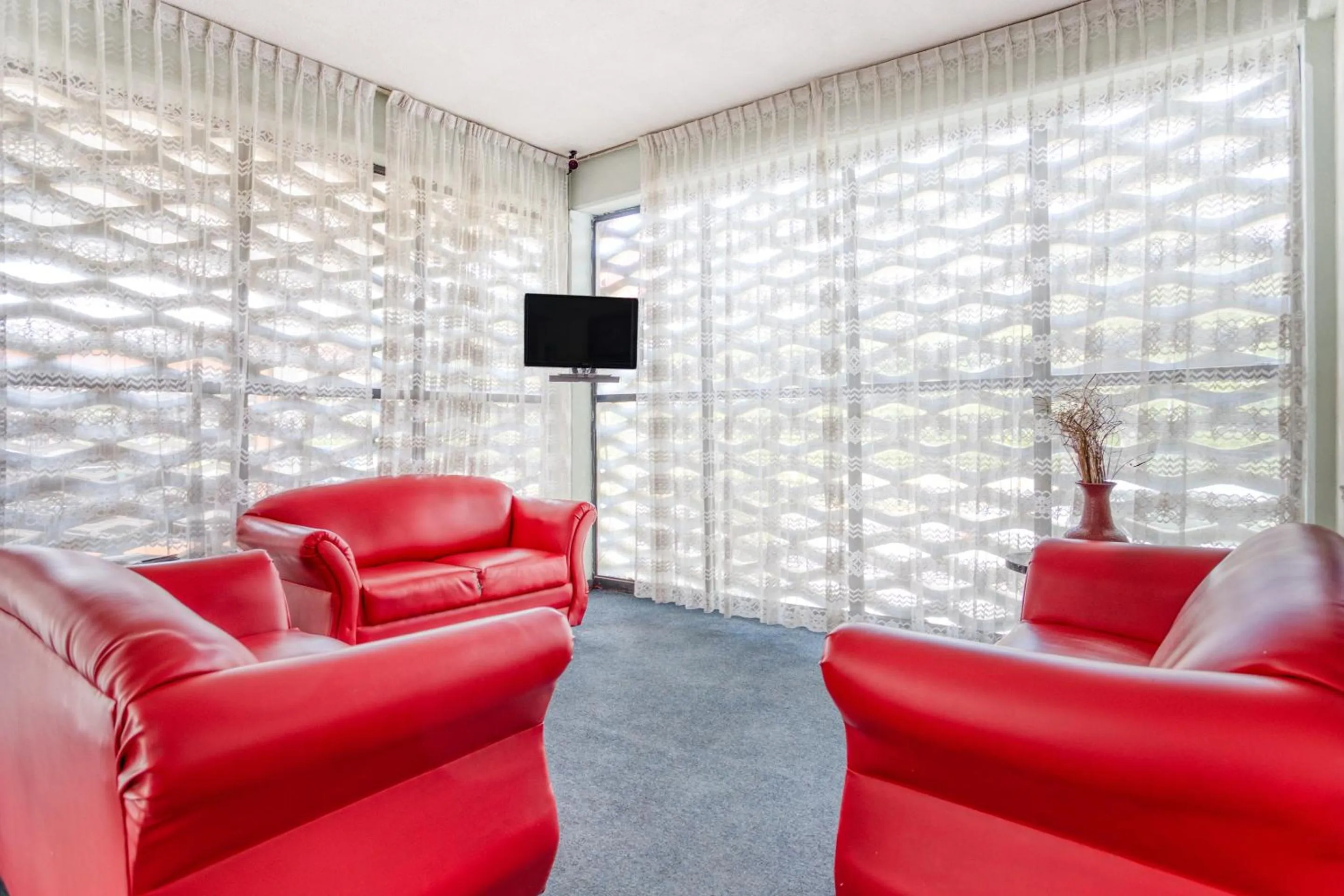 Lobby or reception in Hotel Suites Puebla