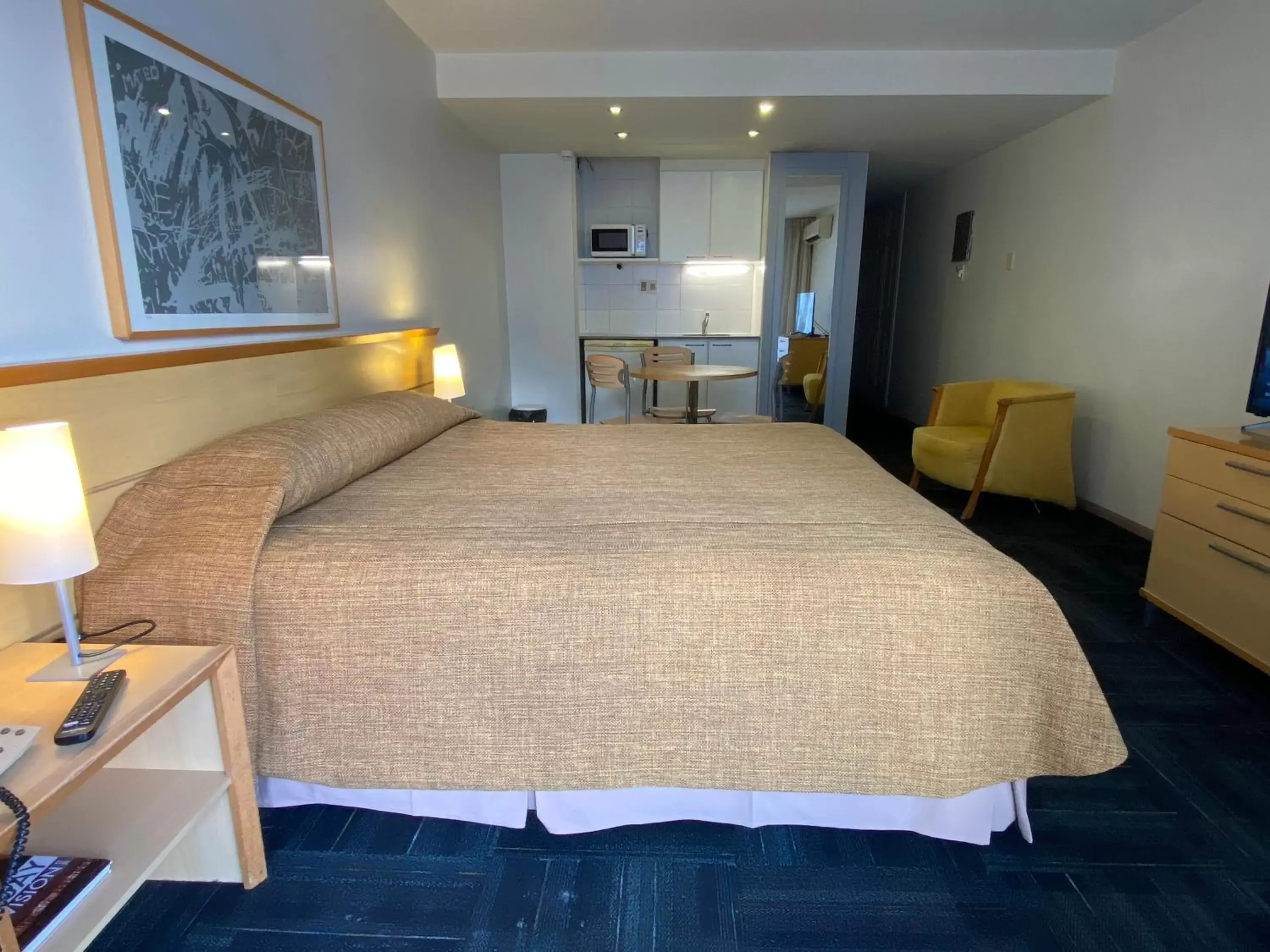 Photo of the whole room, Bed in Punta Trouville Hotel