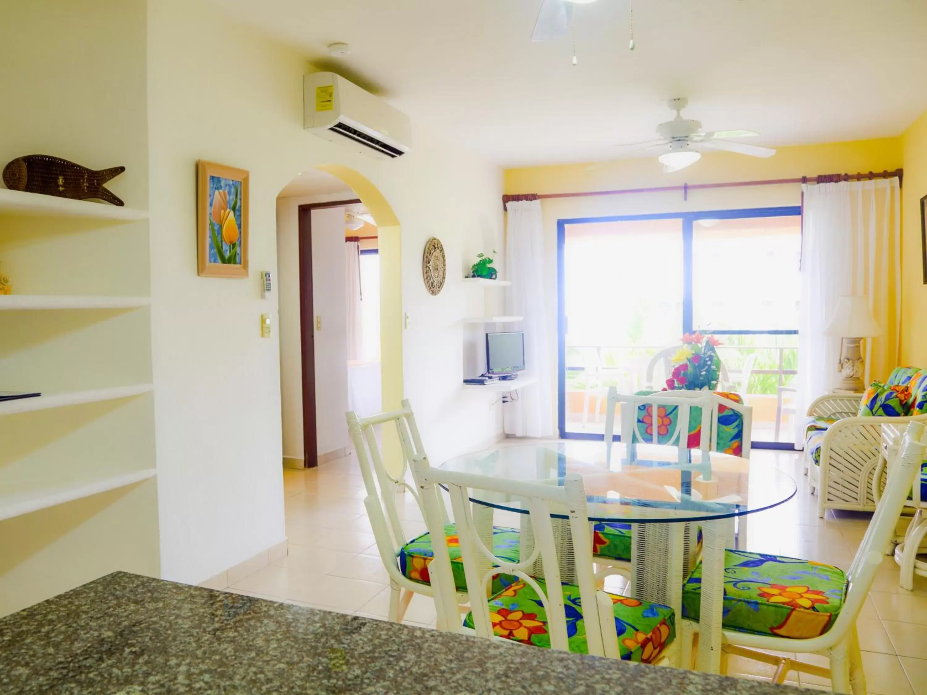 Living room, Dining Area in Nautibeach Beach Front Condos in North Beach