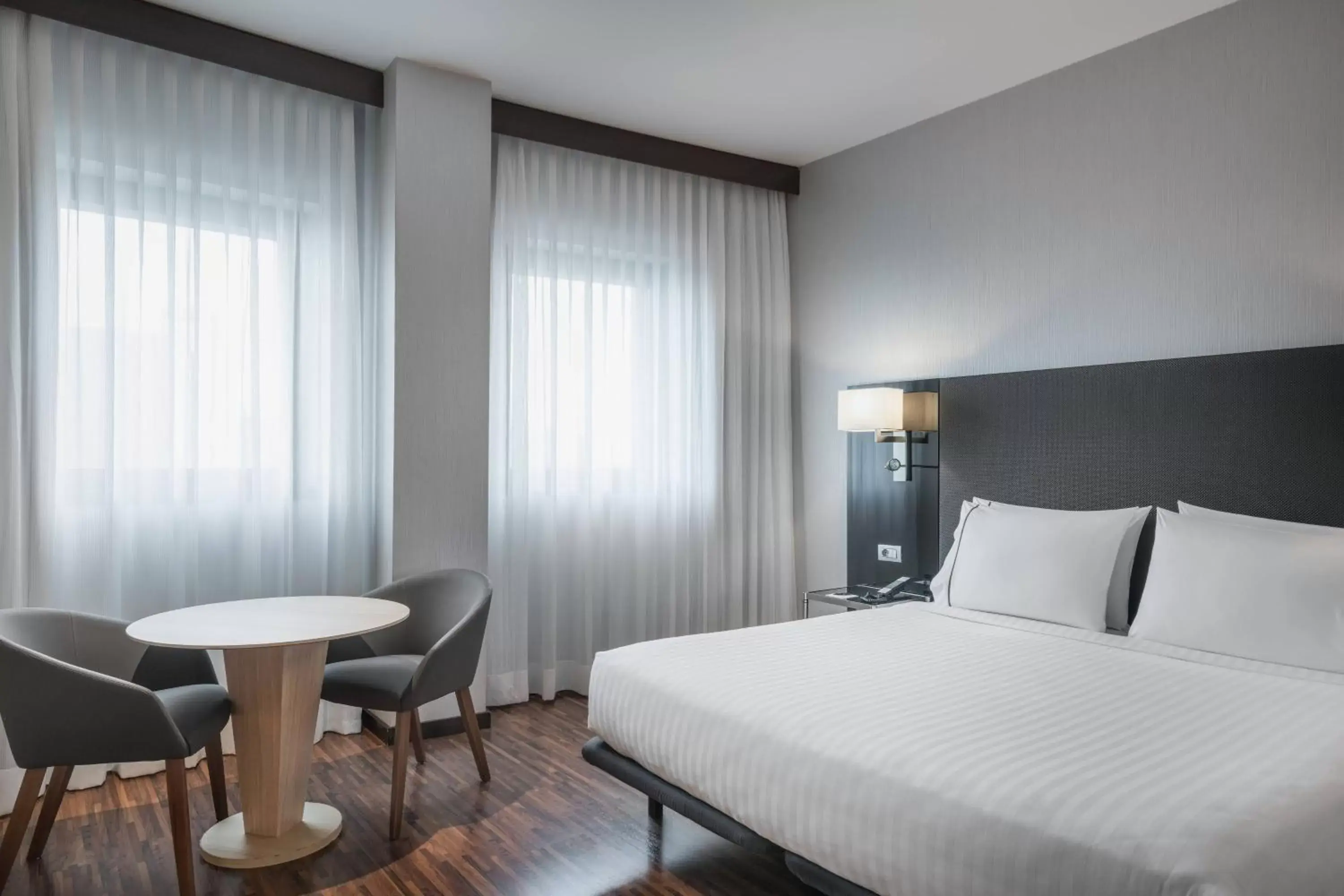 Photo of the whole room, Bed in AC Hotel Milano by Marriott