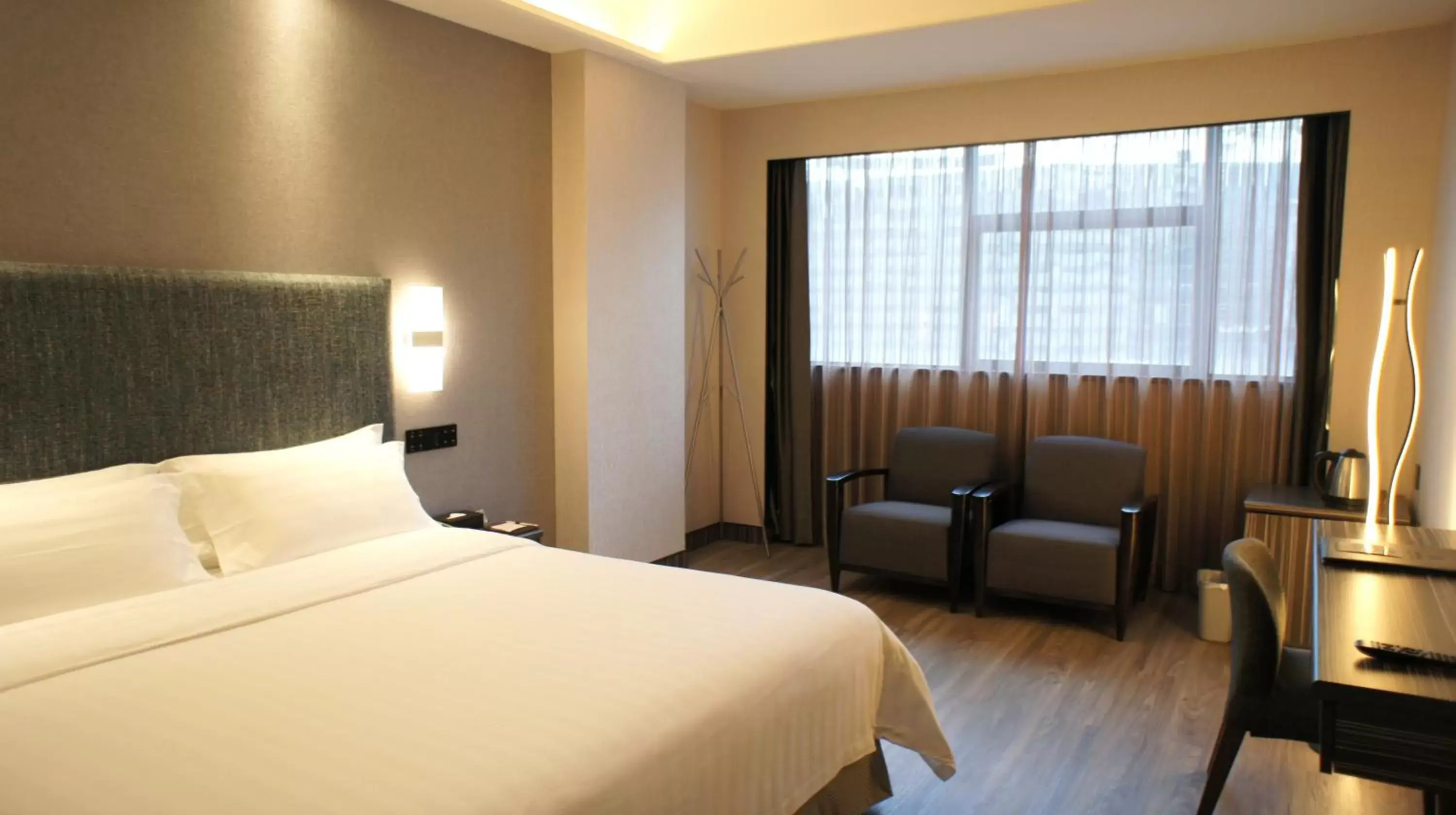 Bed in Shenzhen Lido Hotel