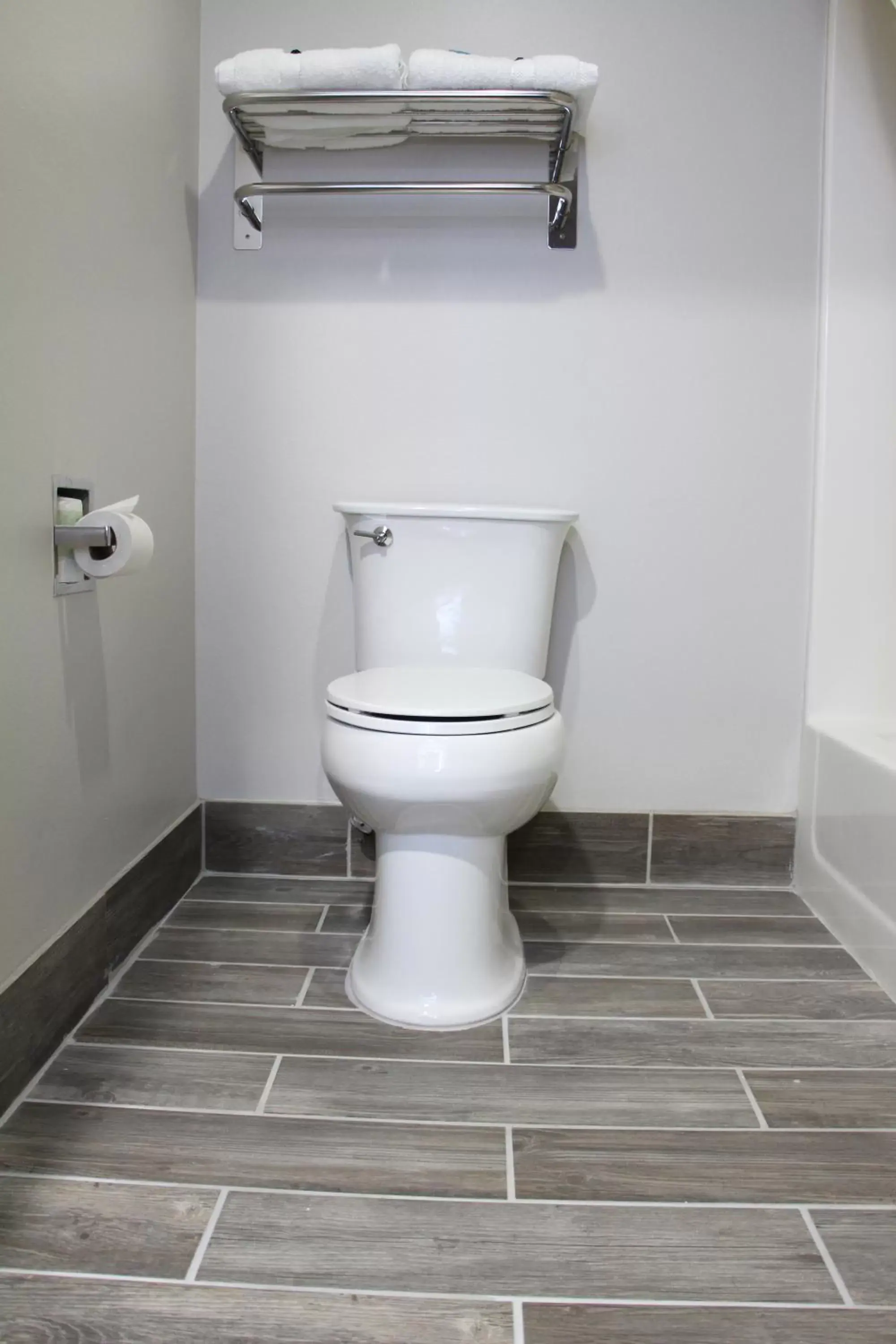 Toilet, Bathroom in Westbridge Inn & Suites