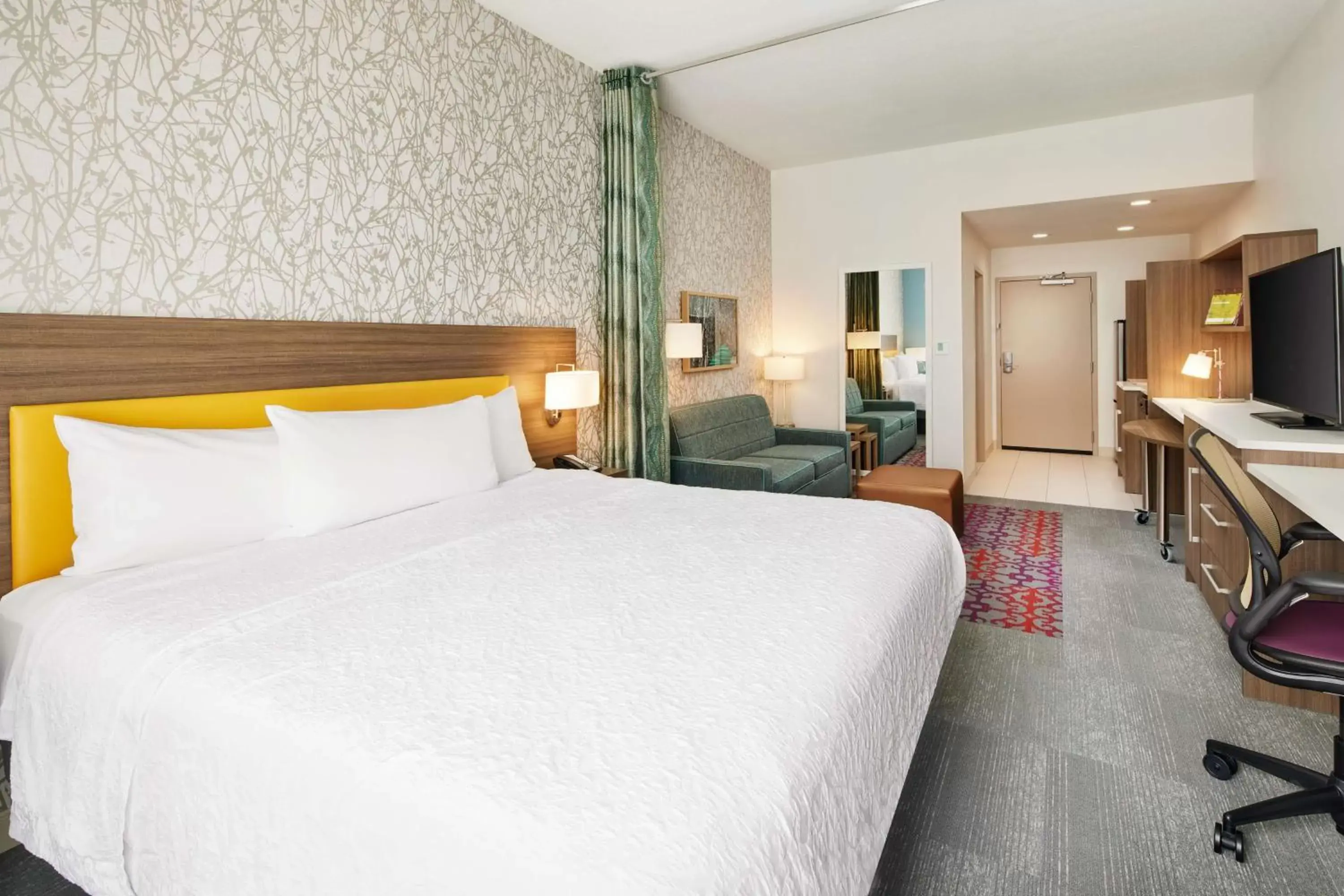 Living room, Bed in Home2 Suites By Hilton Stuart Living room, Bed in Home2 Suites By Hilton Stuart