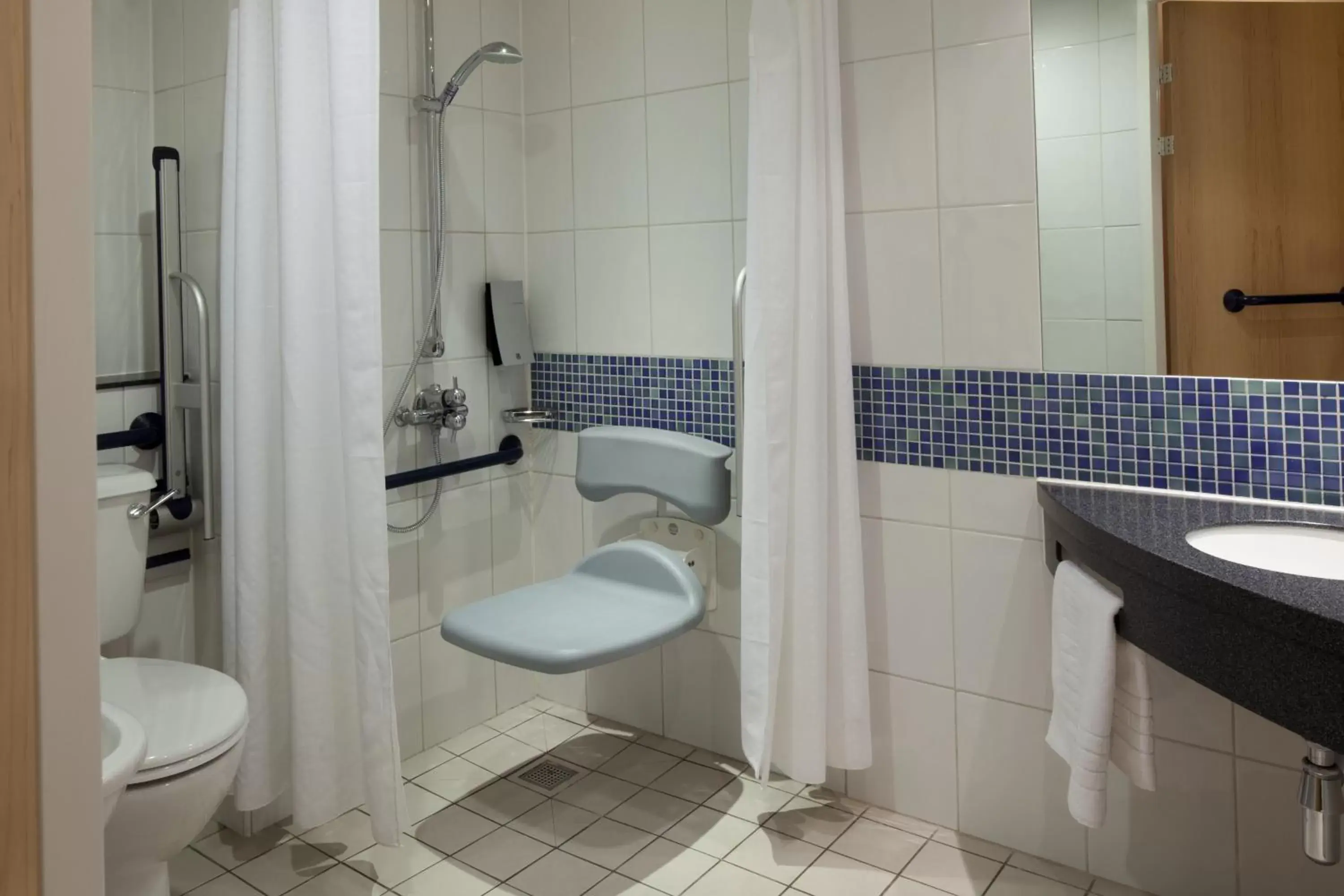 Bathroom in Holiday Inn Express Walsall M6, J10 by IHG Bathroom in Holiday Inn Express Walsall M6, J10 by IHG