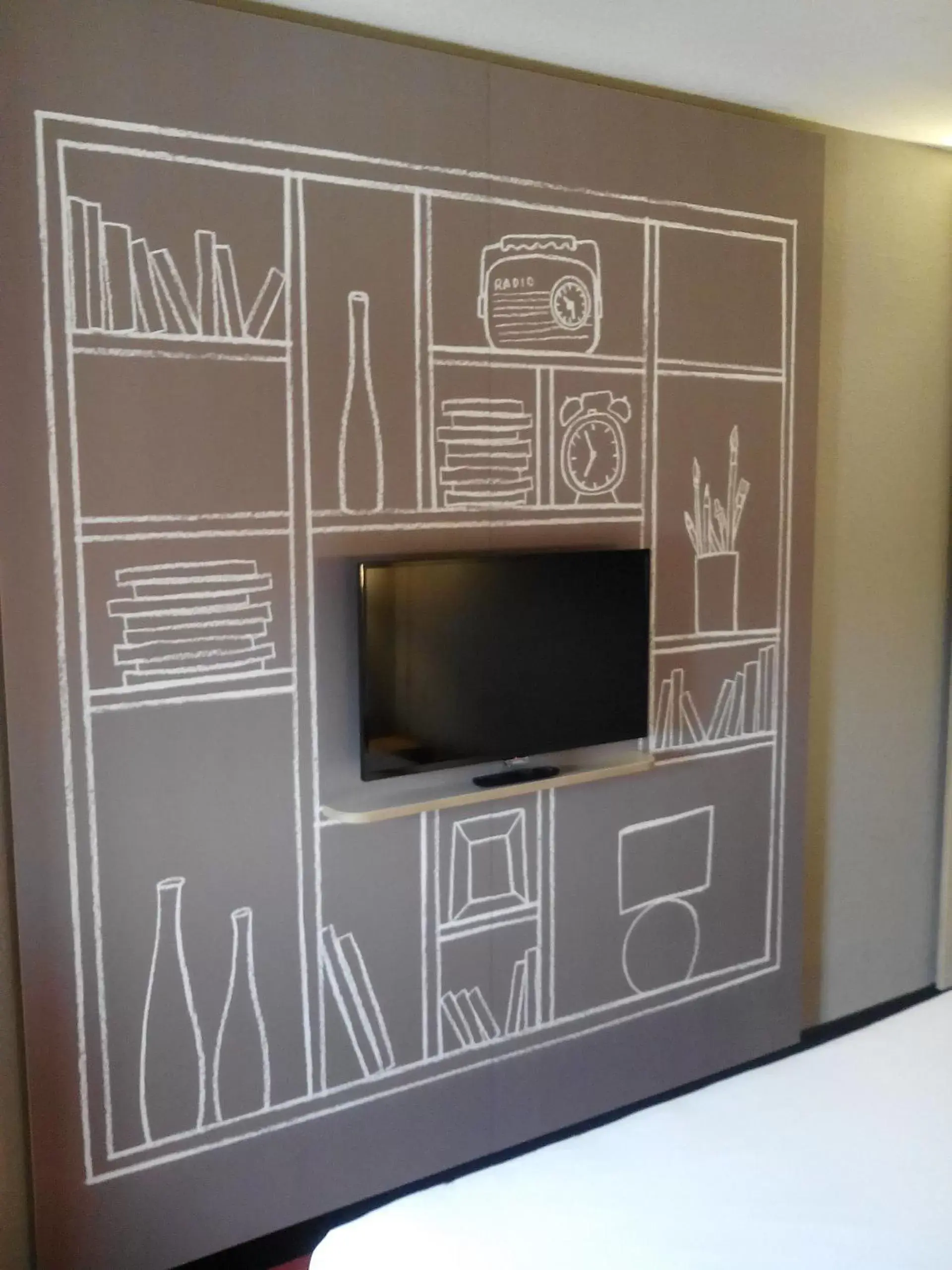 Decorative detail, TV/Entertainment Center in Ibis Aéroport Bâle Mulhouse