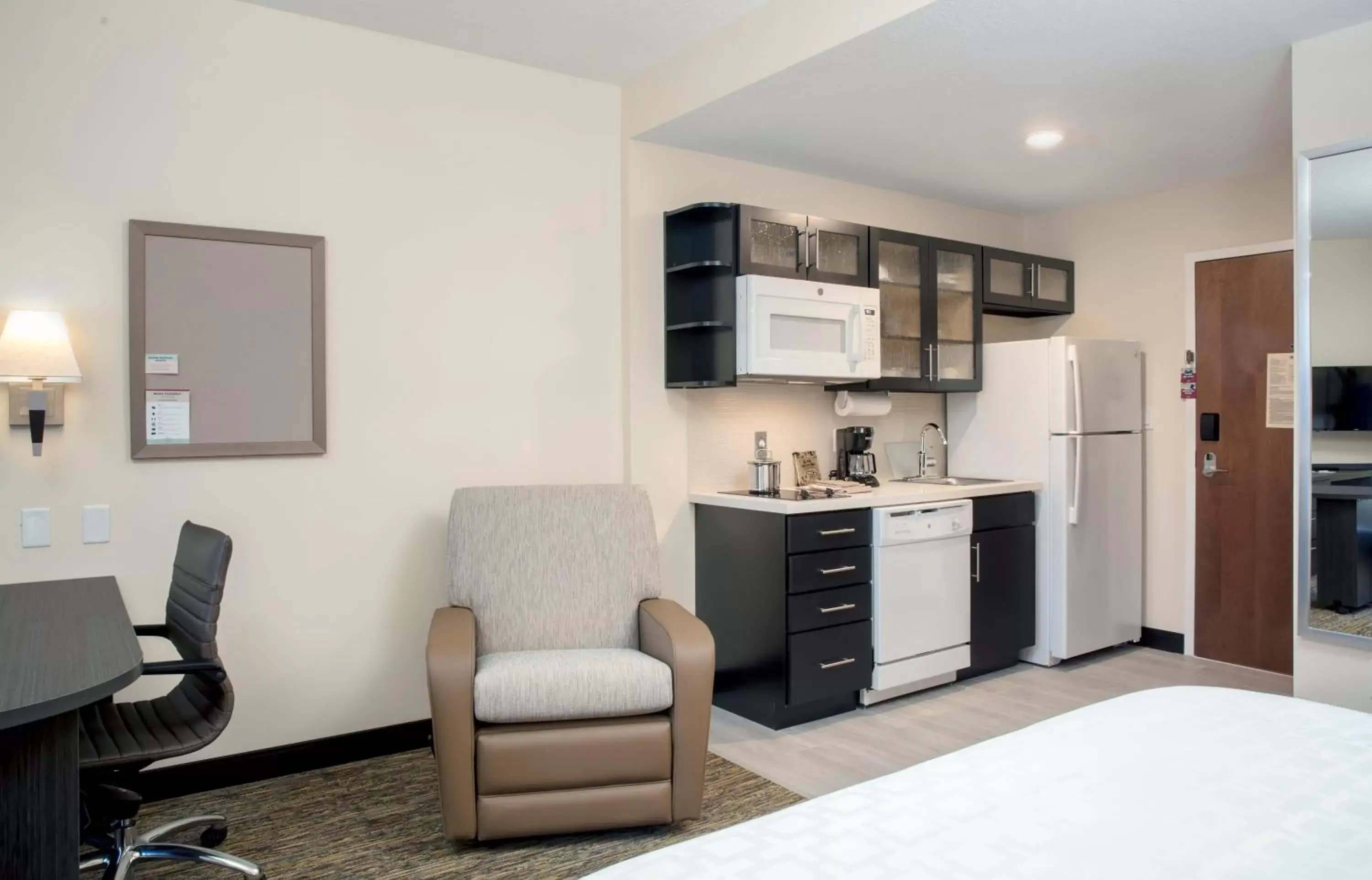 Photo of the whole room, Kitchen/Kitchenette in Candlewood Suites - Miami Exec Airport - Kendall, an IHG Hotel