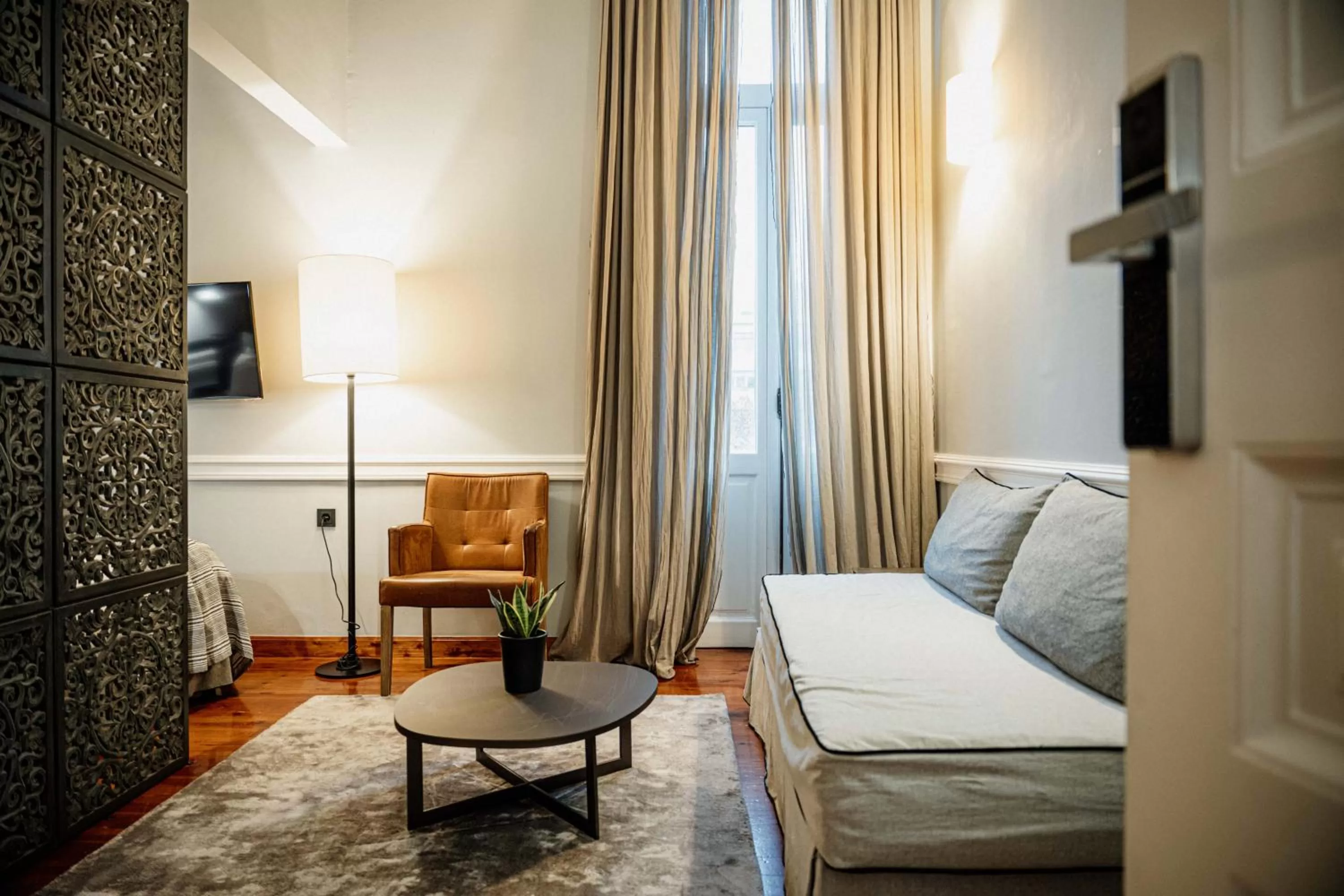 Seating area, Bed in The Zillers Boutique Hotel