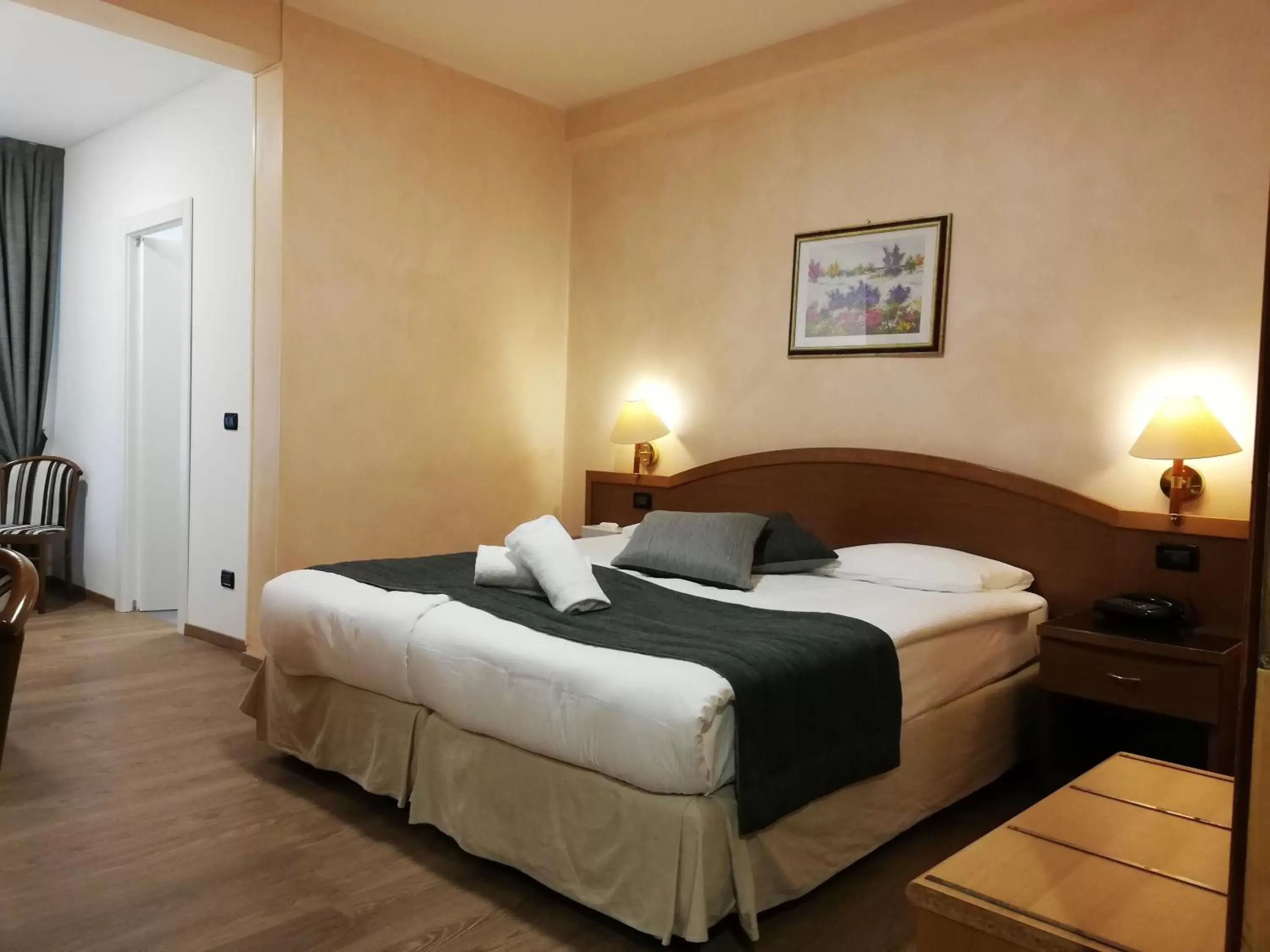 Bed in Coccodrillo Hotel & Apartments