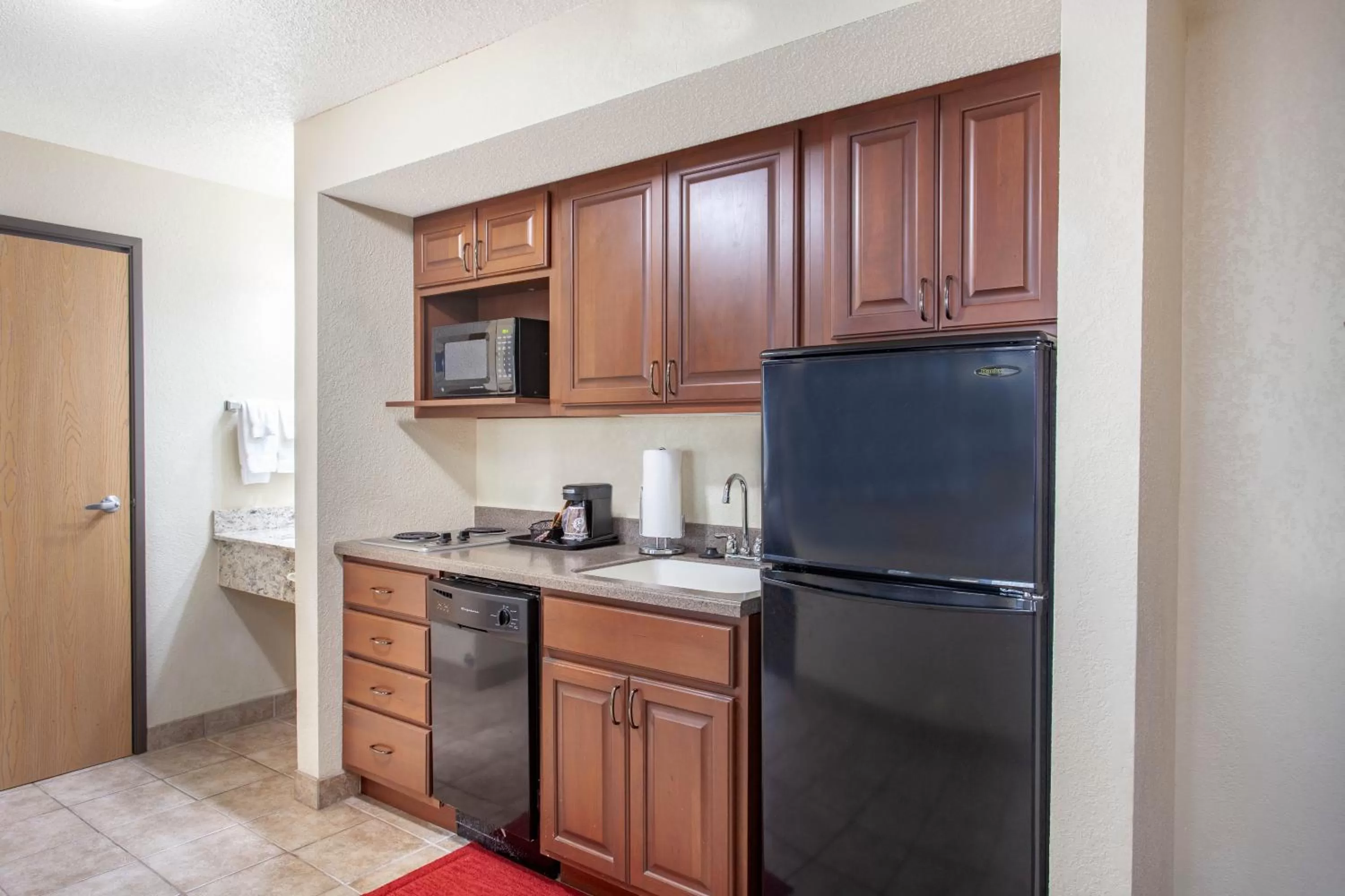 Kitchen or kitchenette in AmericInn by Wyndham Mankato Event Center near MSU