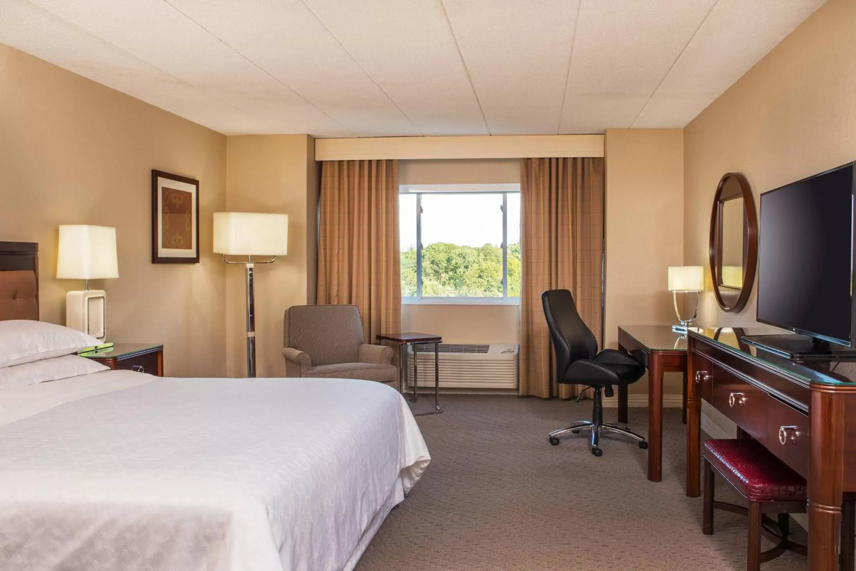 Photo of the whole room, TV/Entertainment Center in Sheraton Framingham Hotel & Conference Center