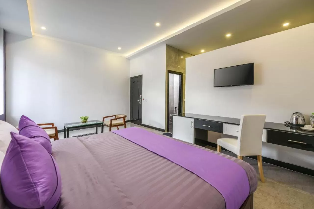 Bed in Flex Urban Family Villa Hotel