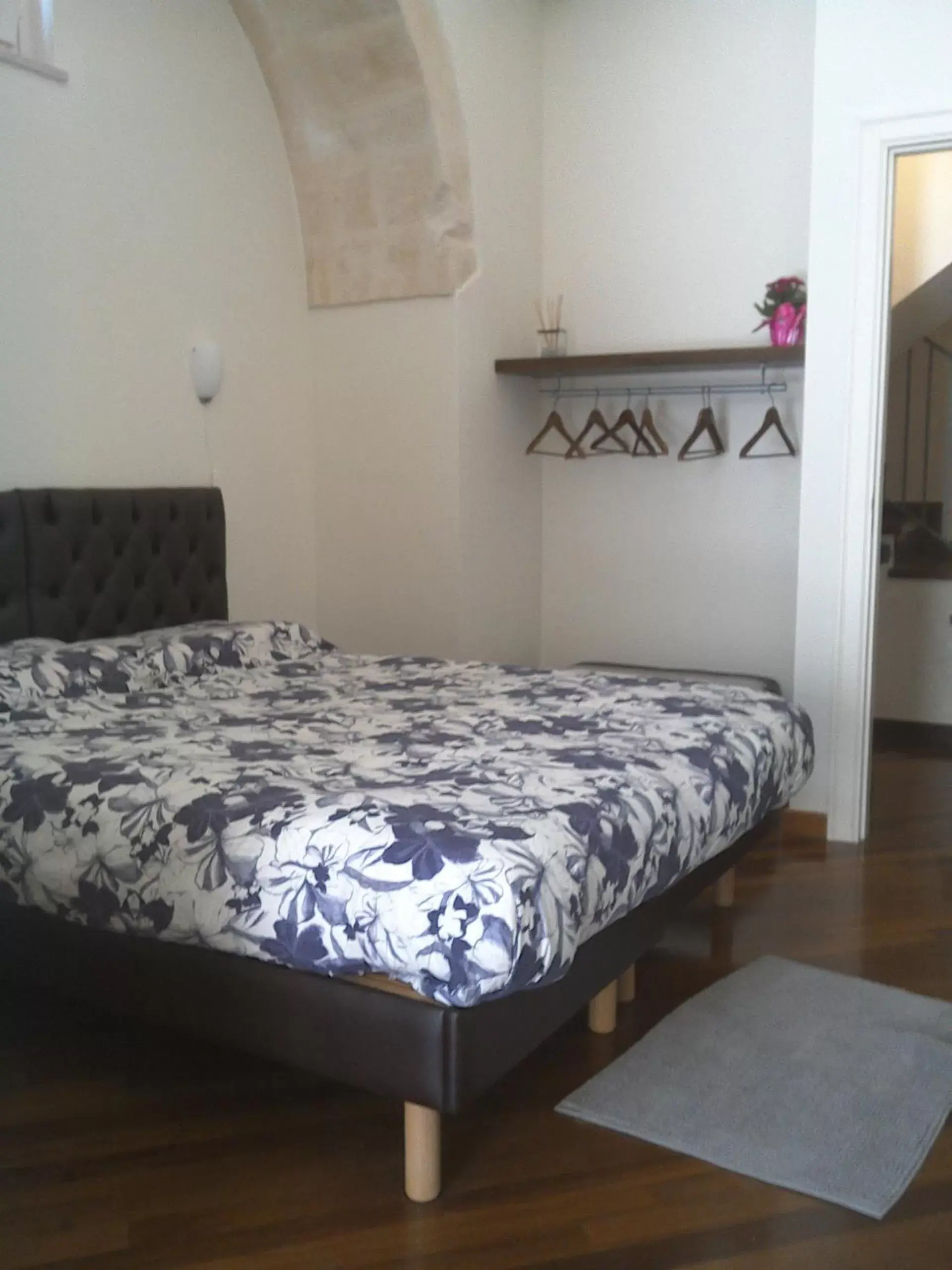 Bed in Alla dimora di Chiara Suite and Rooms