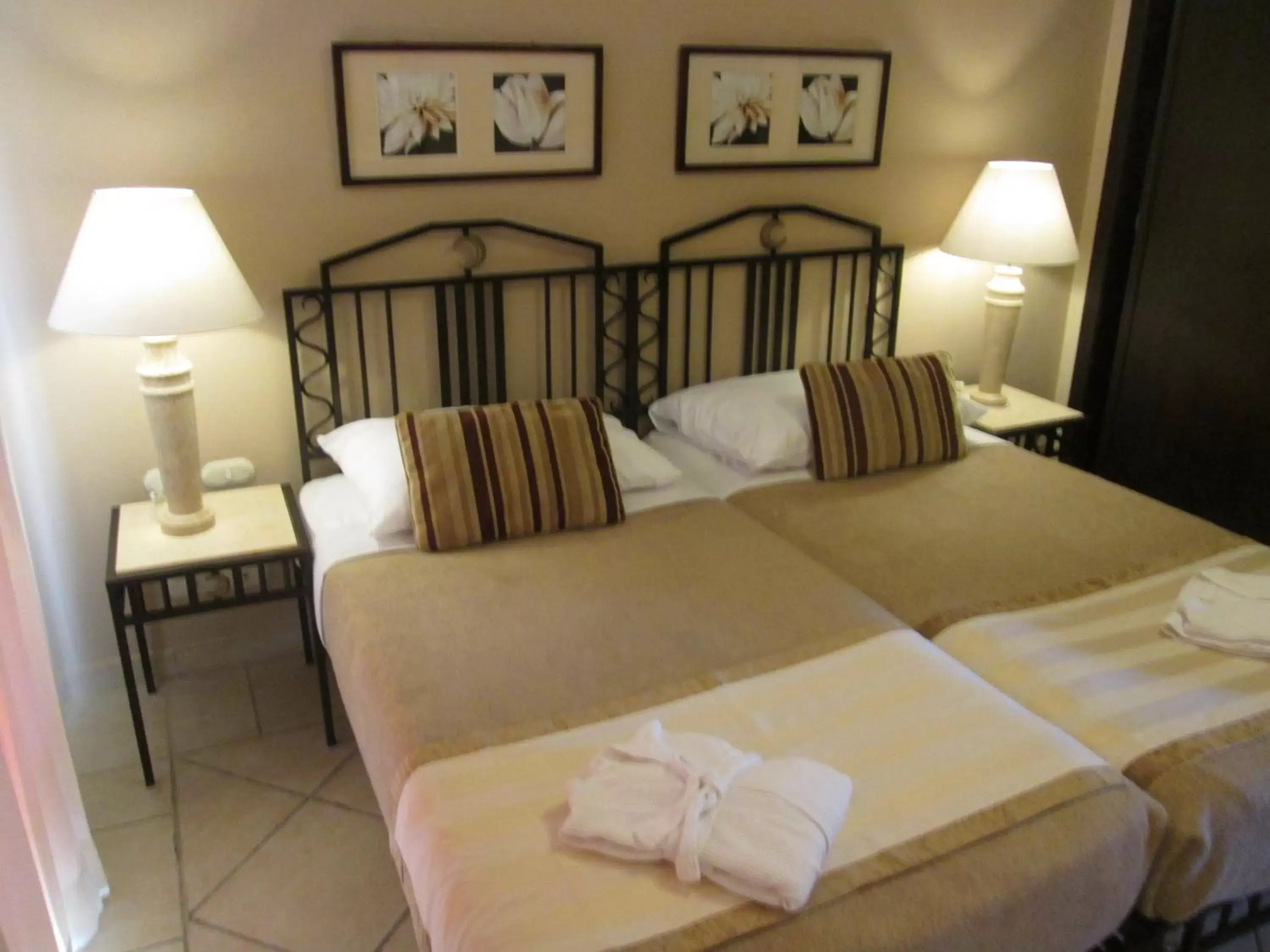 Bed in Solymar Ivory Suites