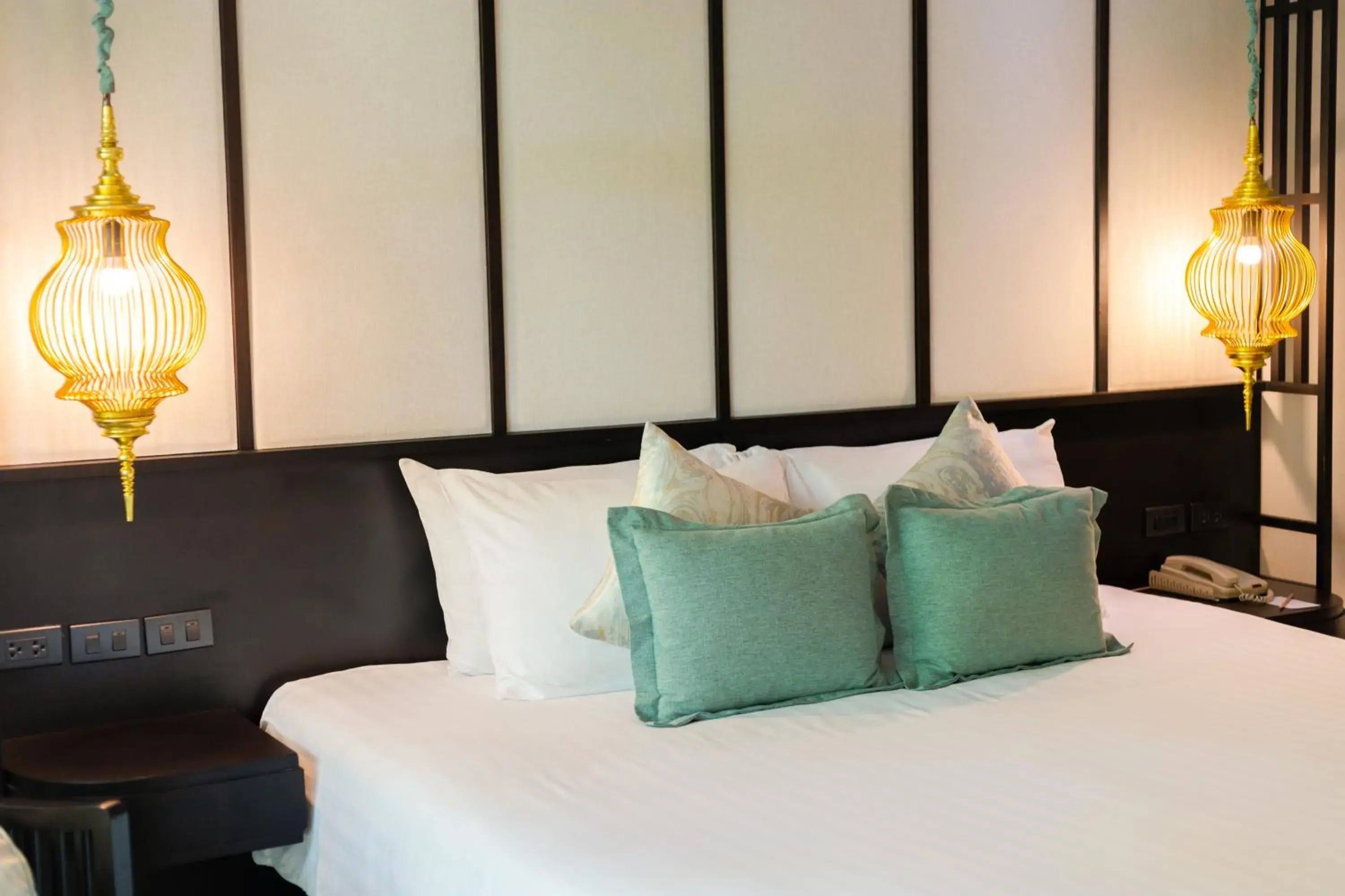 Bed in Ravindra Beach Resort & Spa - SHA Extra Plus
