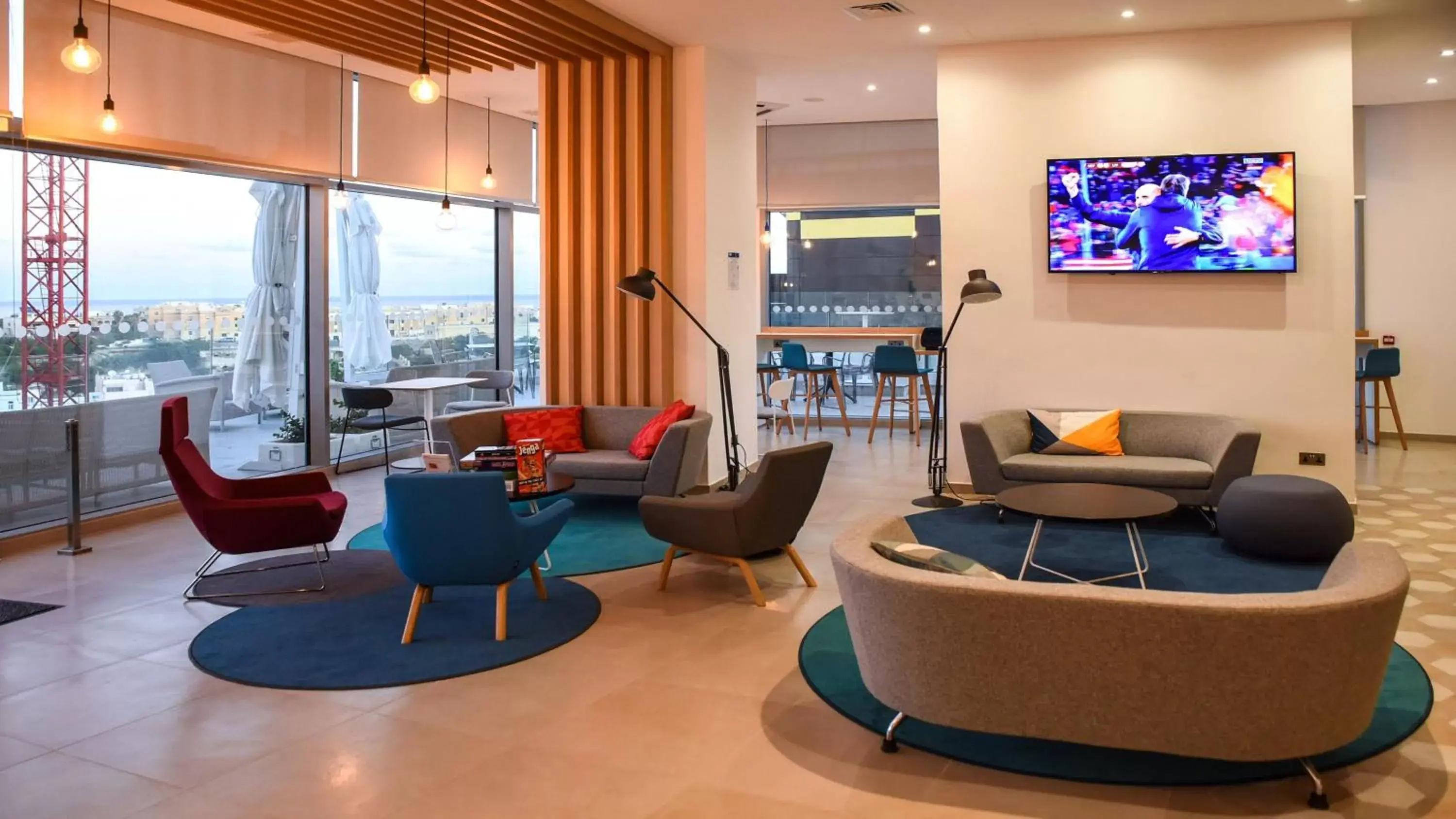 Lobby or reception, Seating Area in Holiday Inn Express - Malta, an IHG Hotel