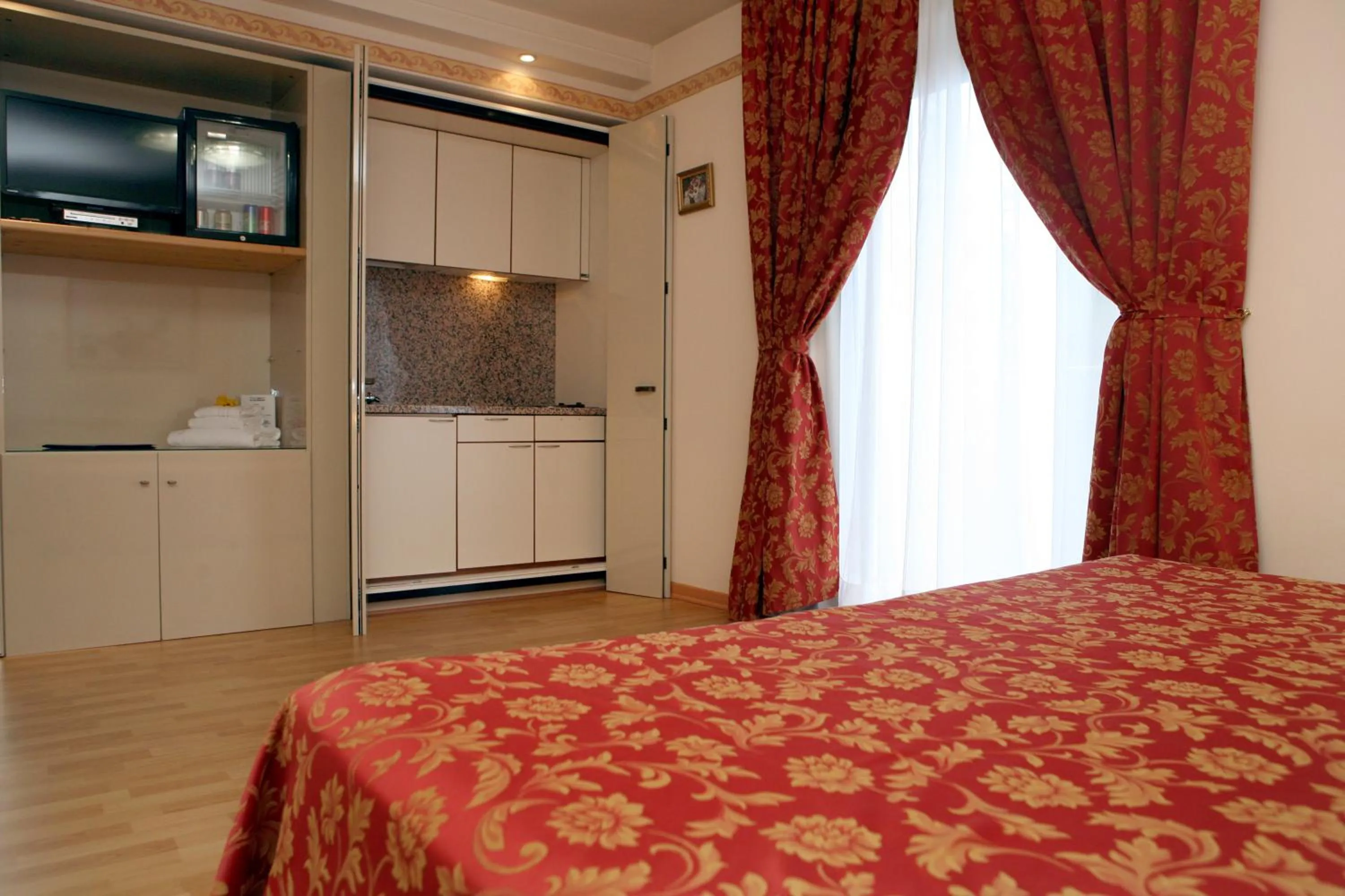 Bed in Hotel Excelsior