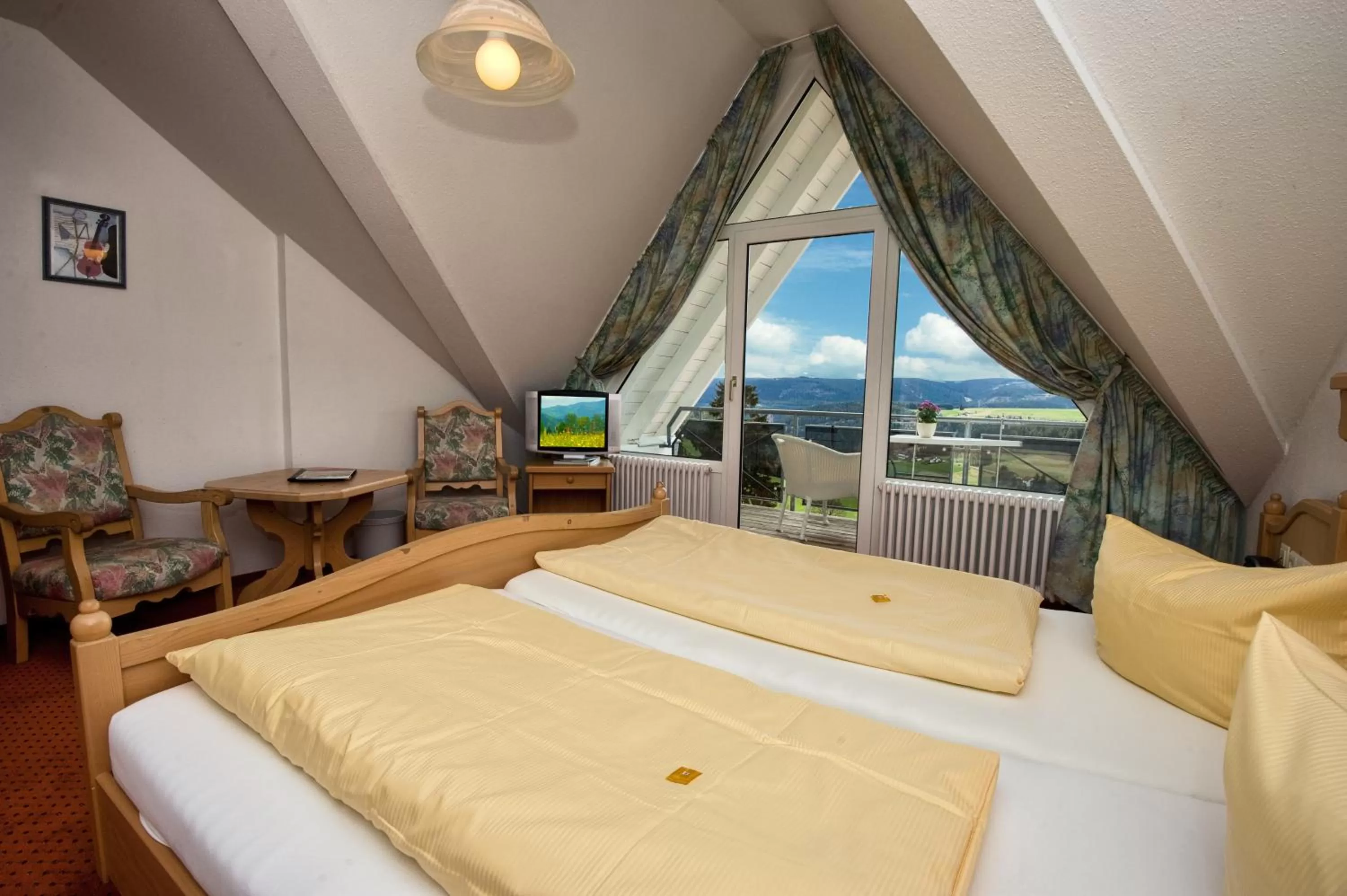 Photo of the whole room, Bed in JUFA Hotel Schwarzwald