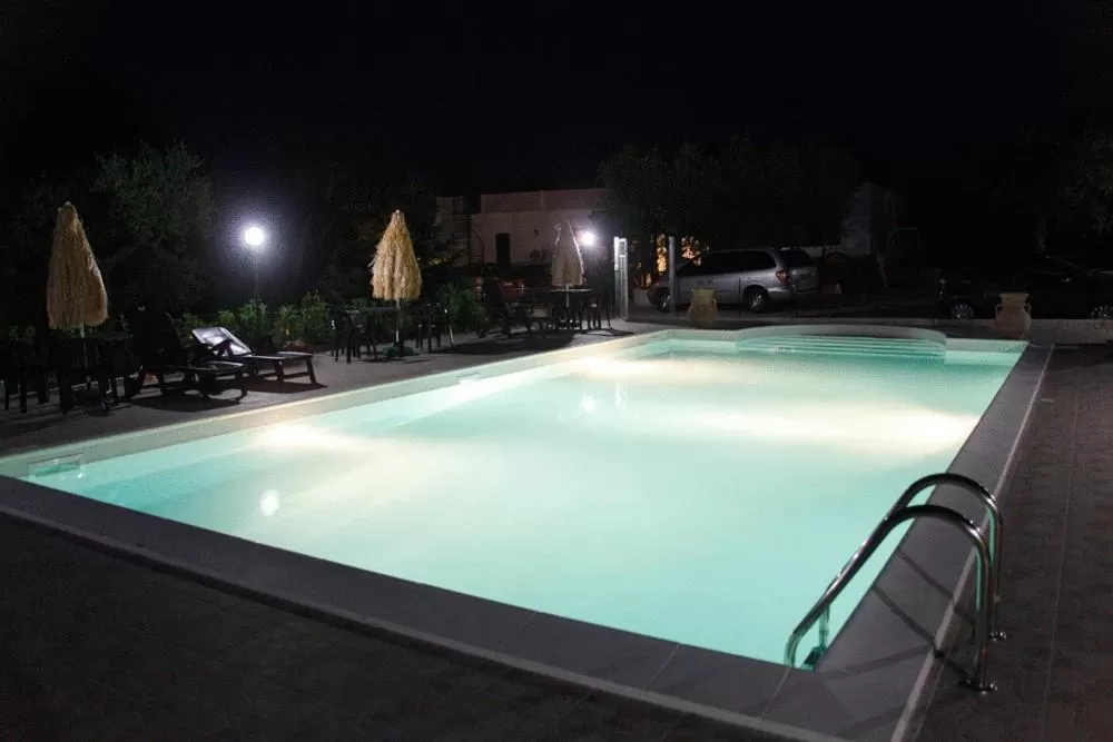 Swimming pool in L'Isola Felice e Trulli Sotto Le Stelle