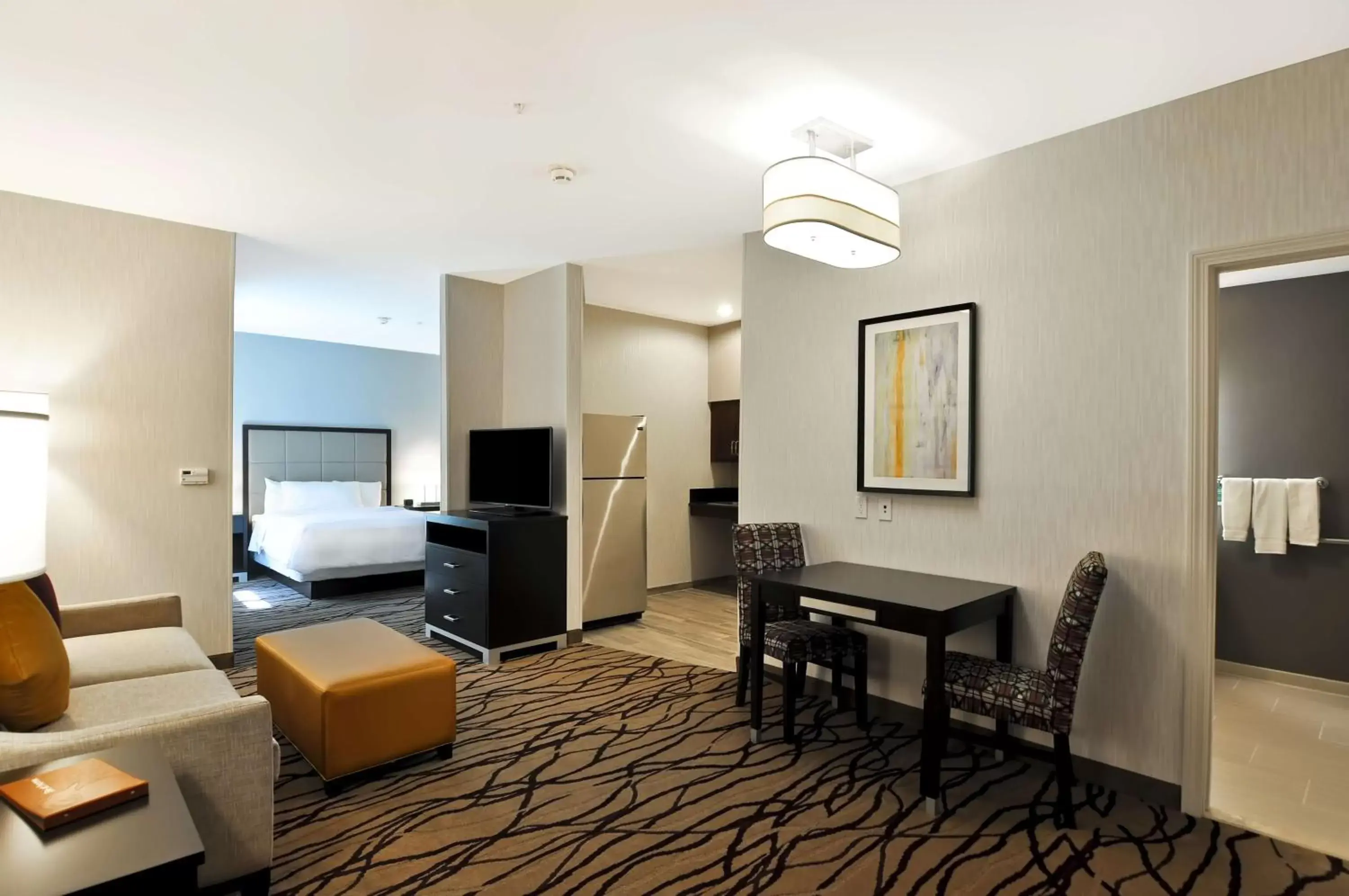 Bed, Seating Area in Homewood Suites by Hilton Boston Cambridge-Arlington, MA