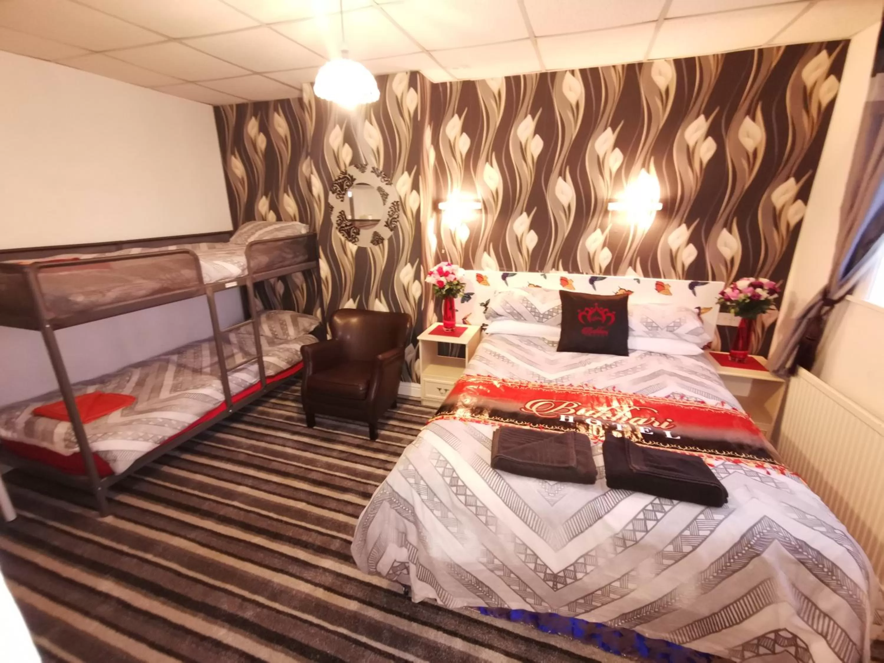 Bed in BUKHARI Hotel