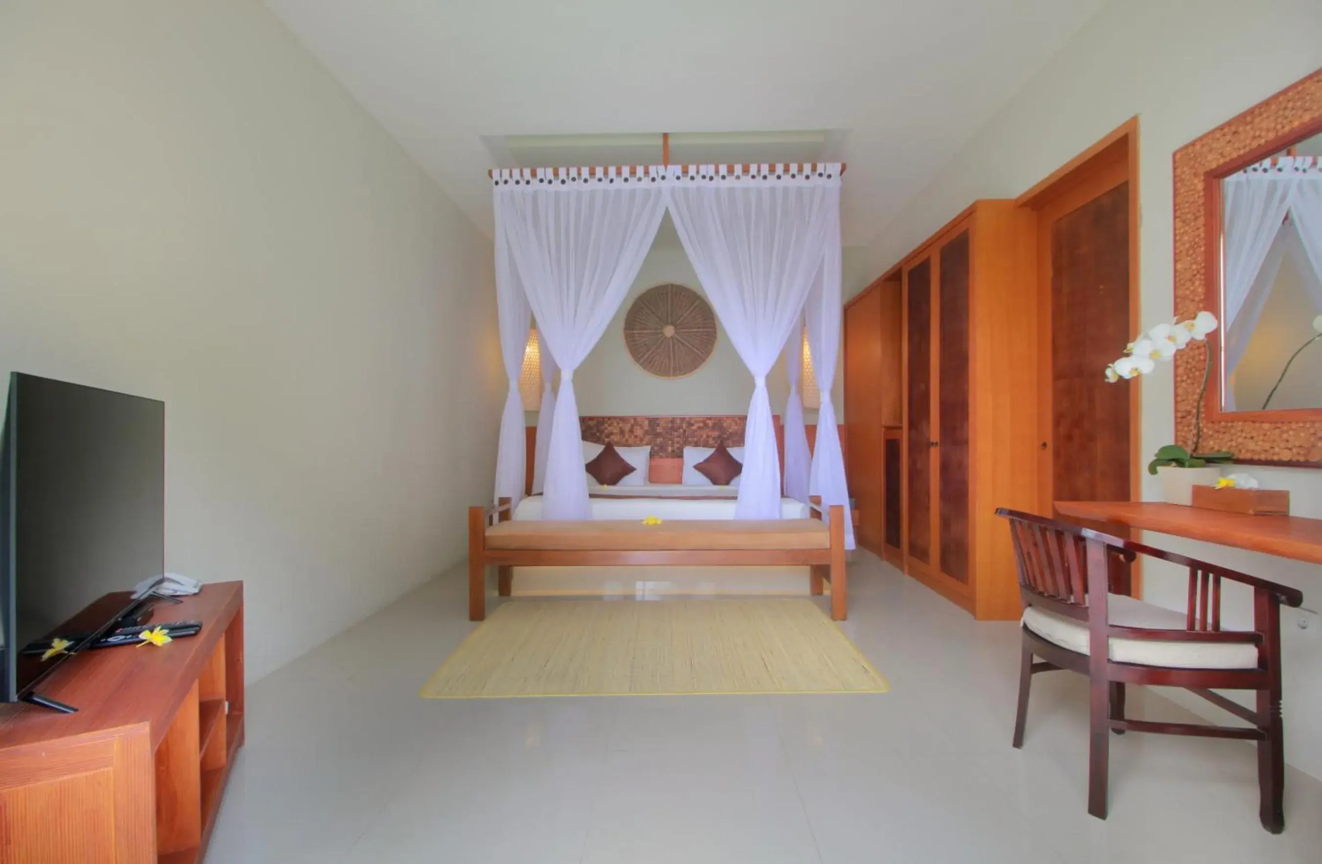 Bedroom, TV/Entertainment Center in Maharaja Villas Bali - CHSE Certified