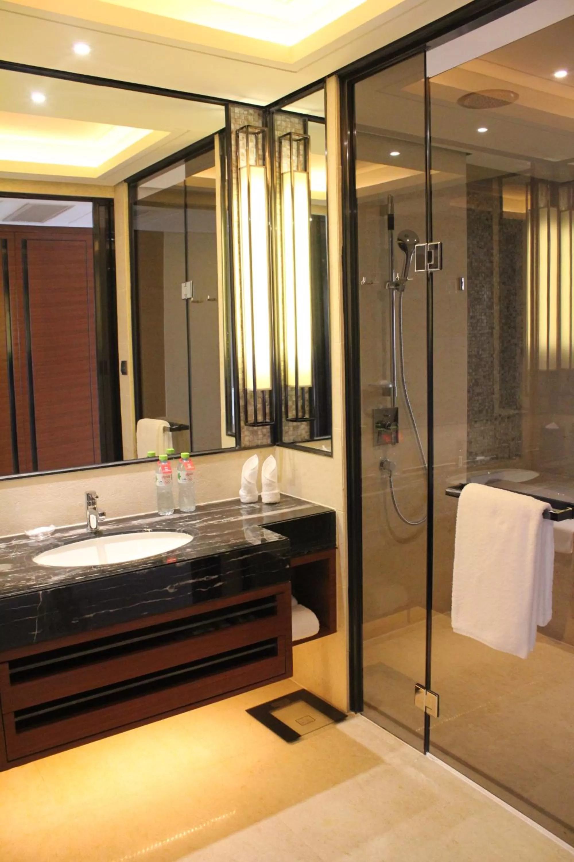 Shower in Crowne Plaza Sanya City Center by IHG