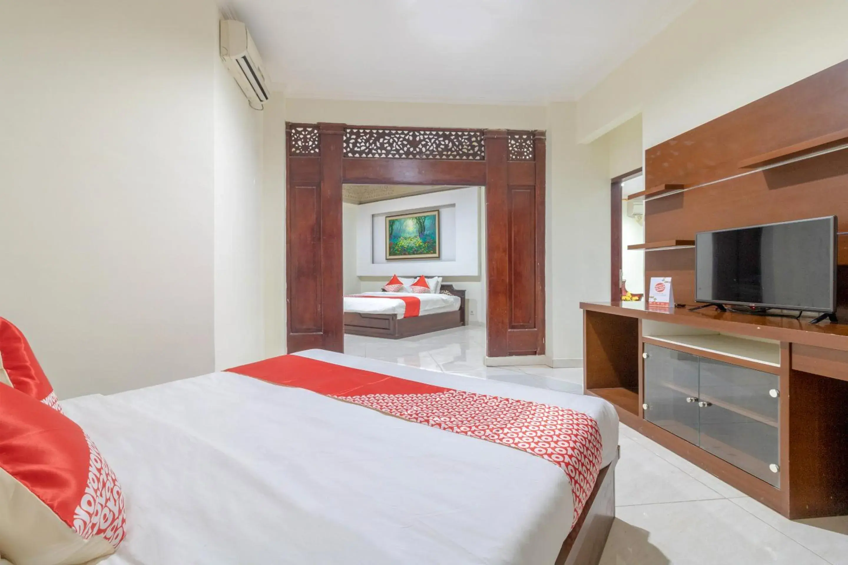 Bedroom, Bed in SUPER OYO Flagship 2688 Guntur Hotel