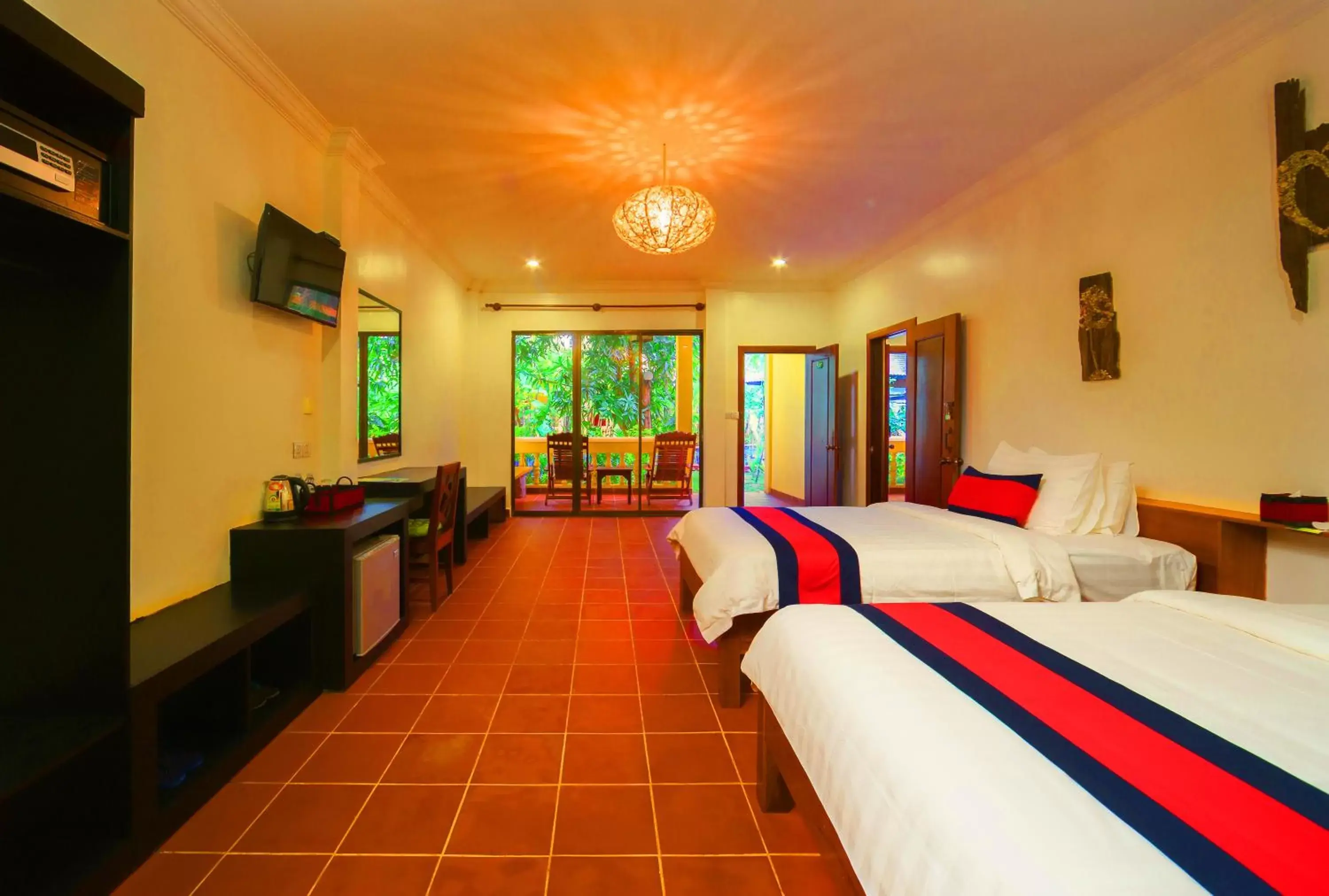 Bedroom in Le Jardin d'Angkor Hotel & Resort